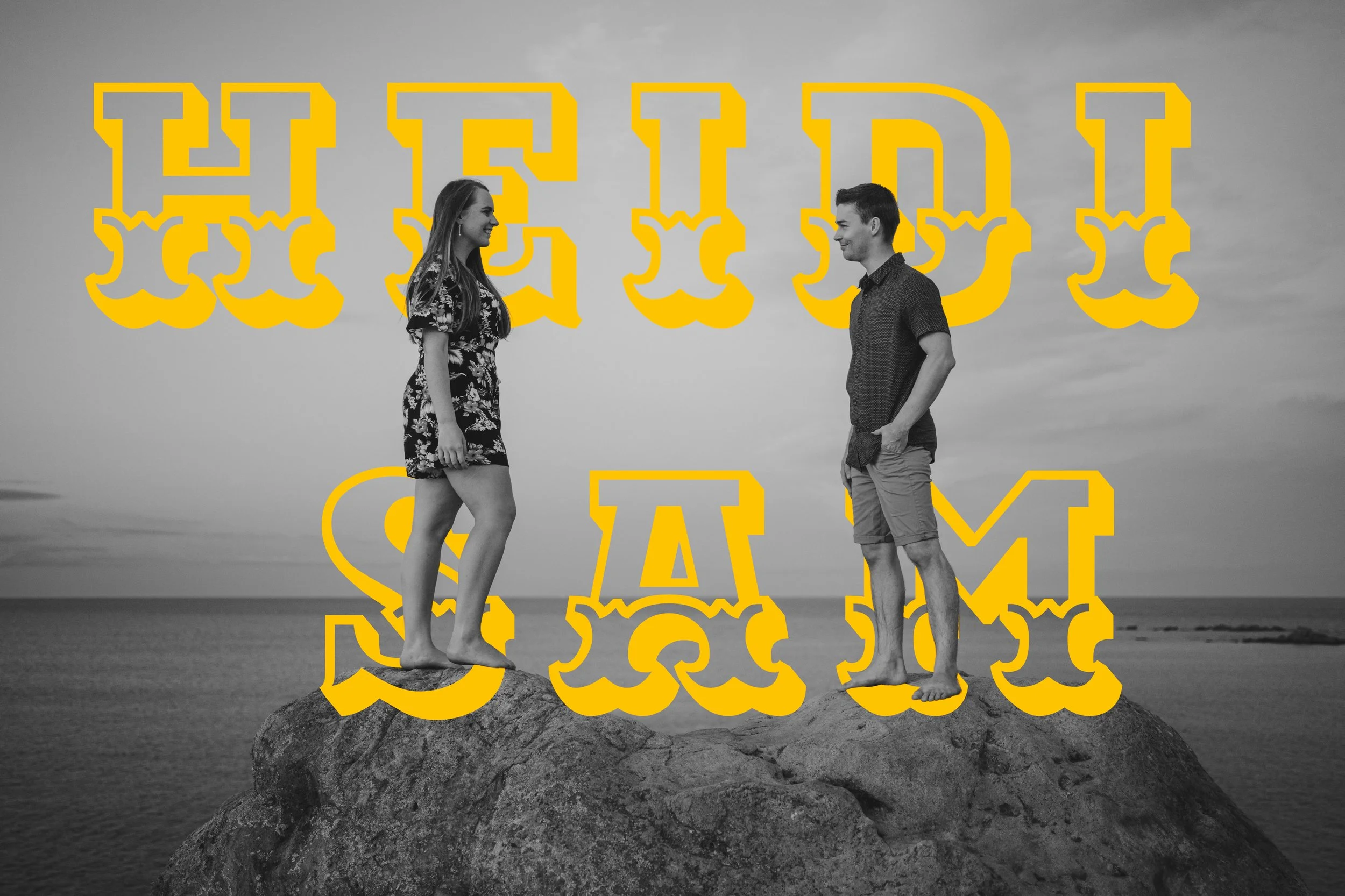 A black-and-white photo of a young man and woman standing on rocks by the water, engaged in conversation, with yellow outlined text reading "HEIDI SAM" overlayed on the image.