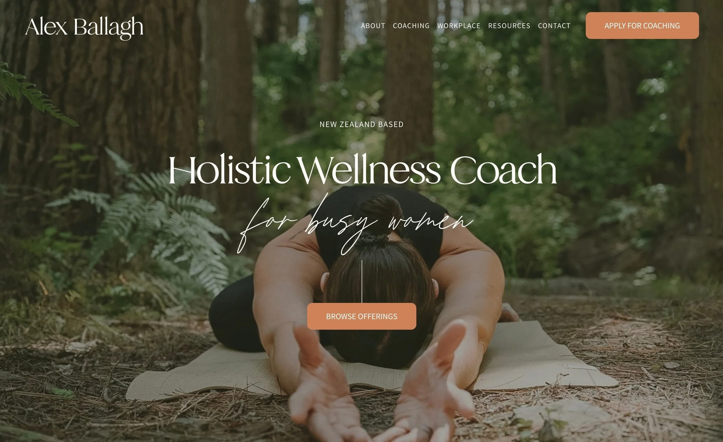 Woman practicing yoga outdoors in a forest, stretching on a mat.