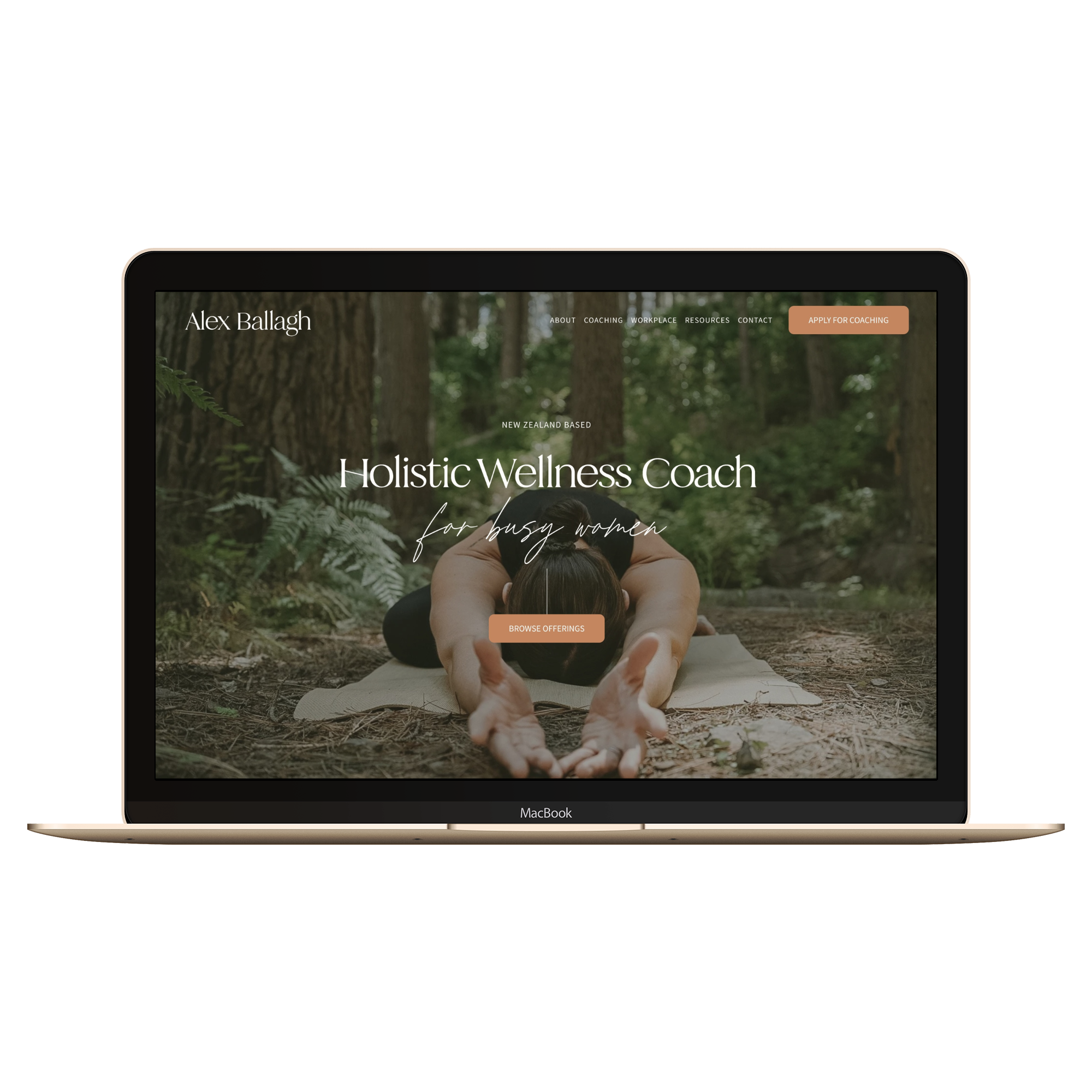 Laptop screen displaying a website for a holistic wellness coach, featuring a woman practicing yoga outdoors in a forest, with text overlay and navigation menu.