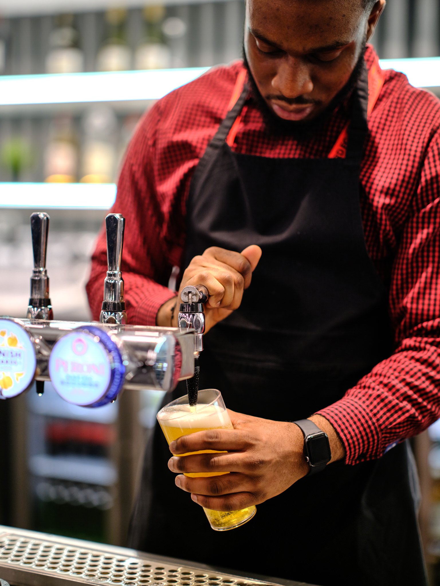 A pint being pulled at Brentford FC Gtech Community Stadium, photography by Premier Stadium Images