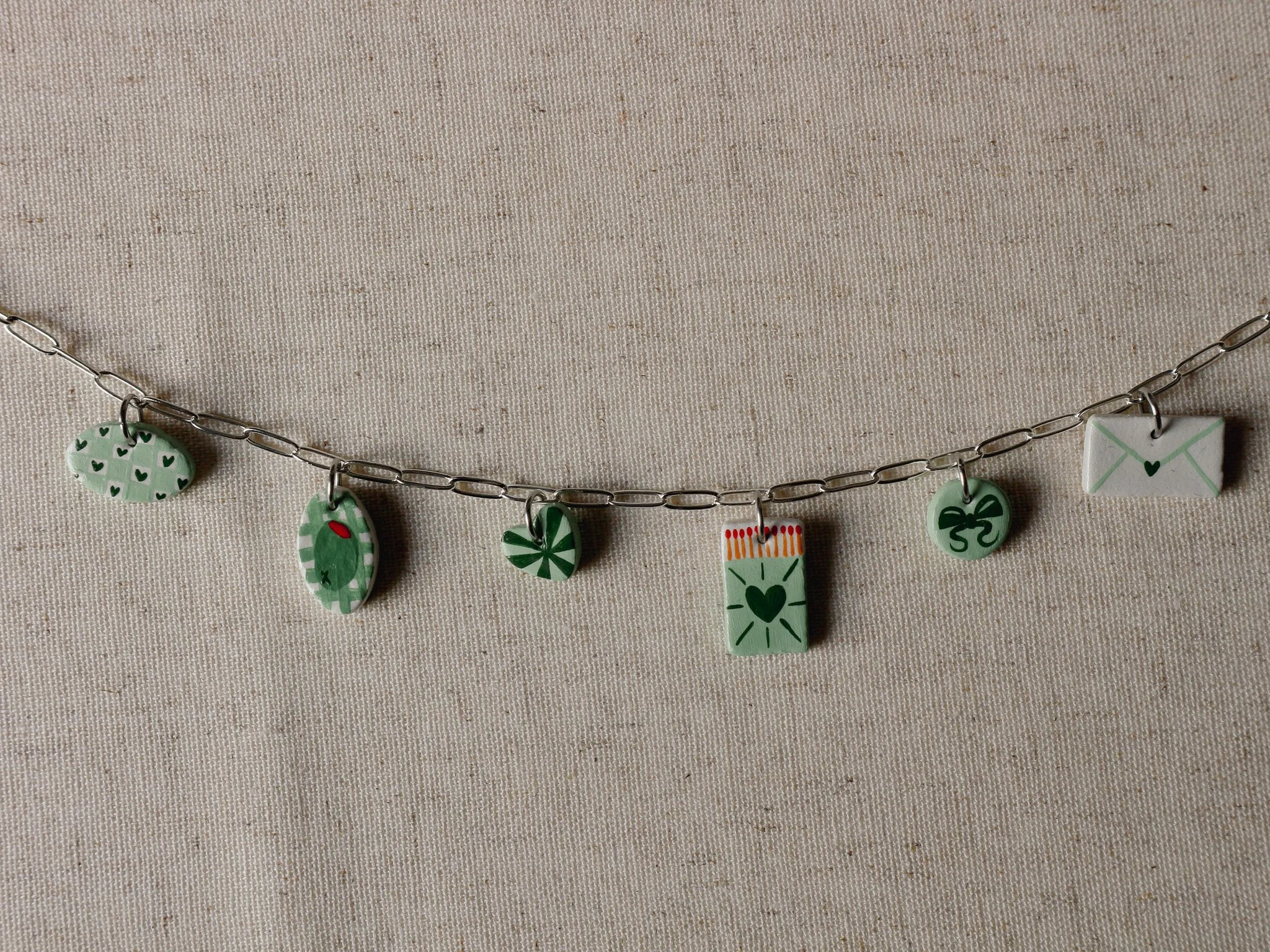 Hand painted clay charm necklace