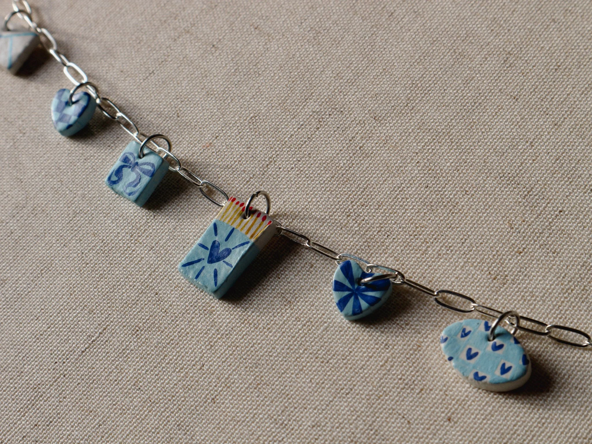 Hand painted blue charm necklace