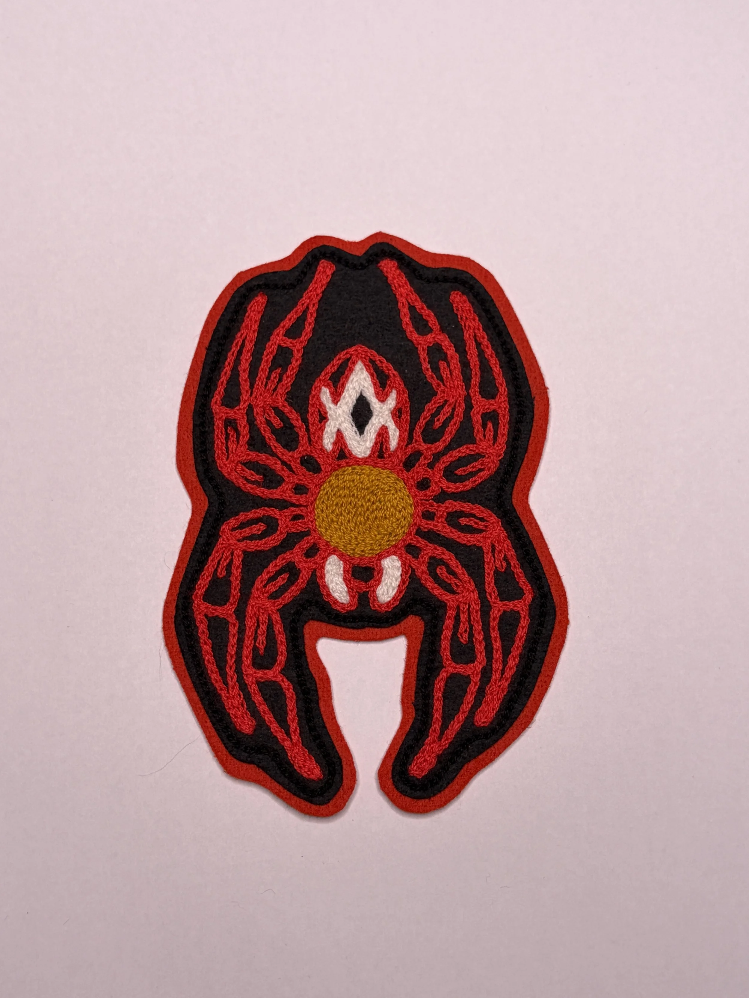 Red and Gold Pattern Spider