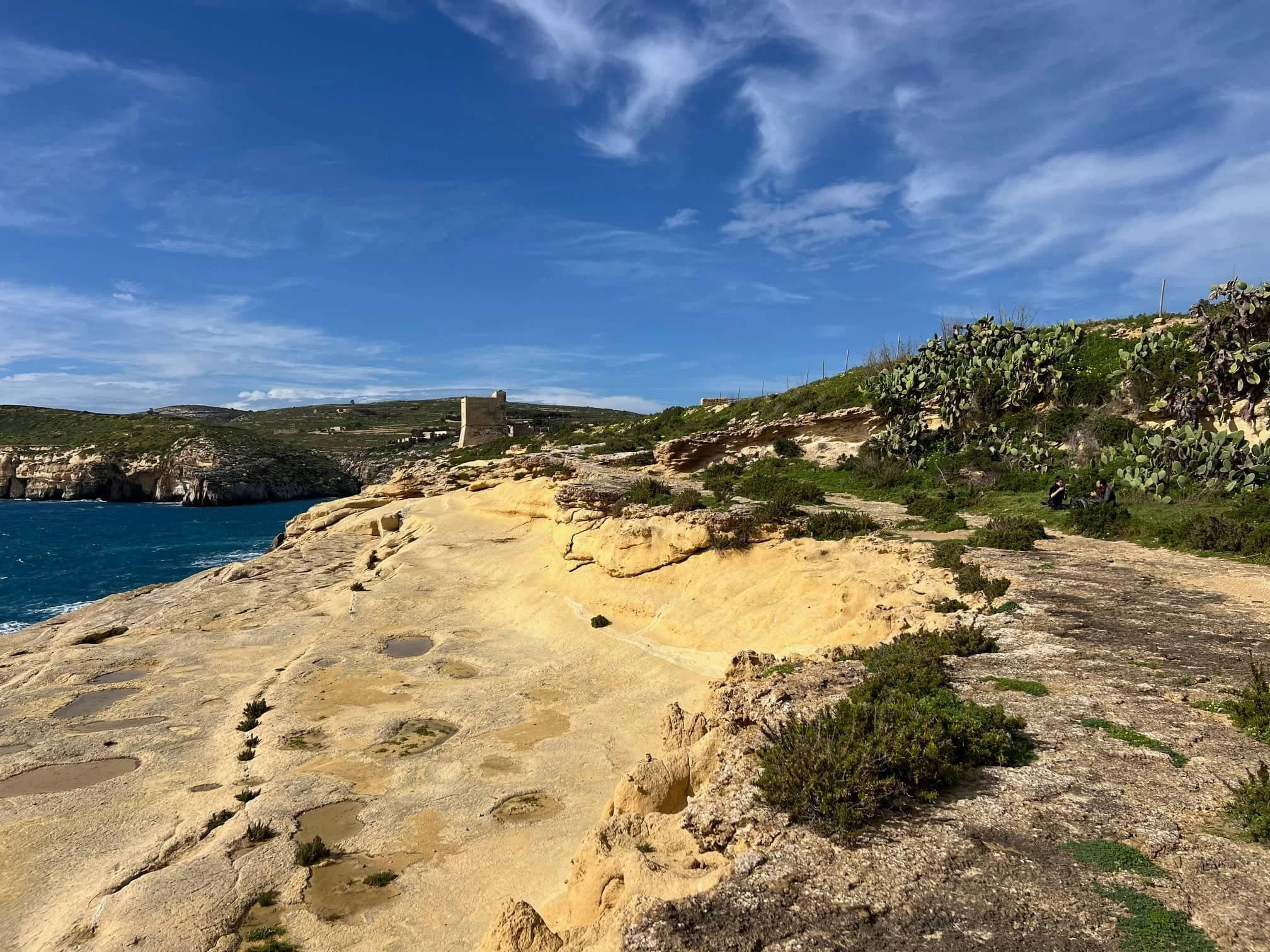 Coastal view looking towards the Torri ta' Mġarr ix-Xini watchtower in Gozo.