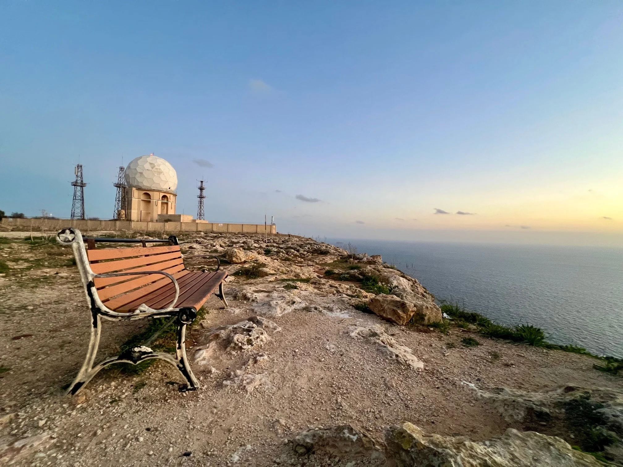 Bench and Radar Station in Background during Dingli Cliffs Sunset.jpg