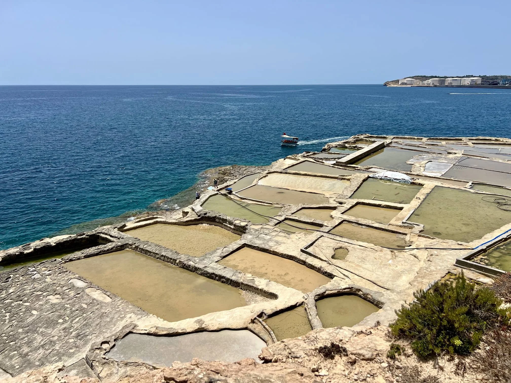 Historic salt pans carved into the rock along the coast of the Delimara peninsula.