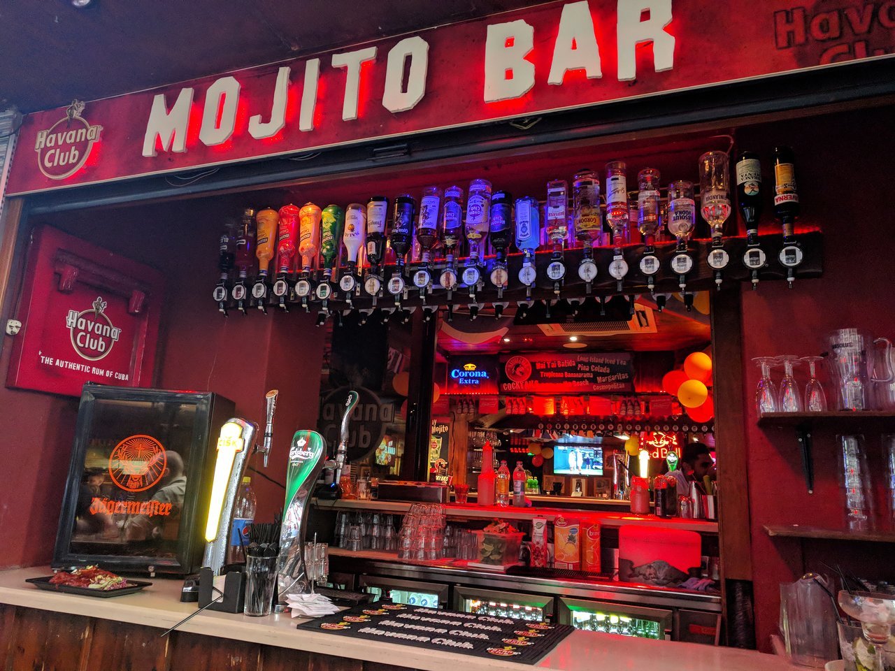 Crowds dancing and drinking at Native Bar in Paceville, a hotspot for Latin music and Reggaeton.