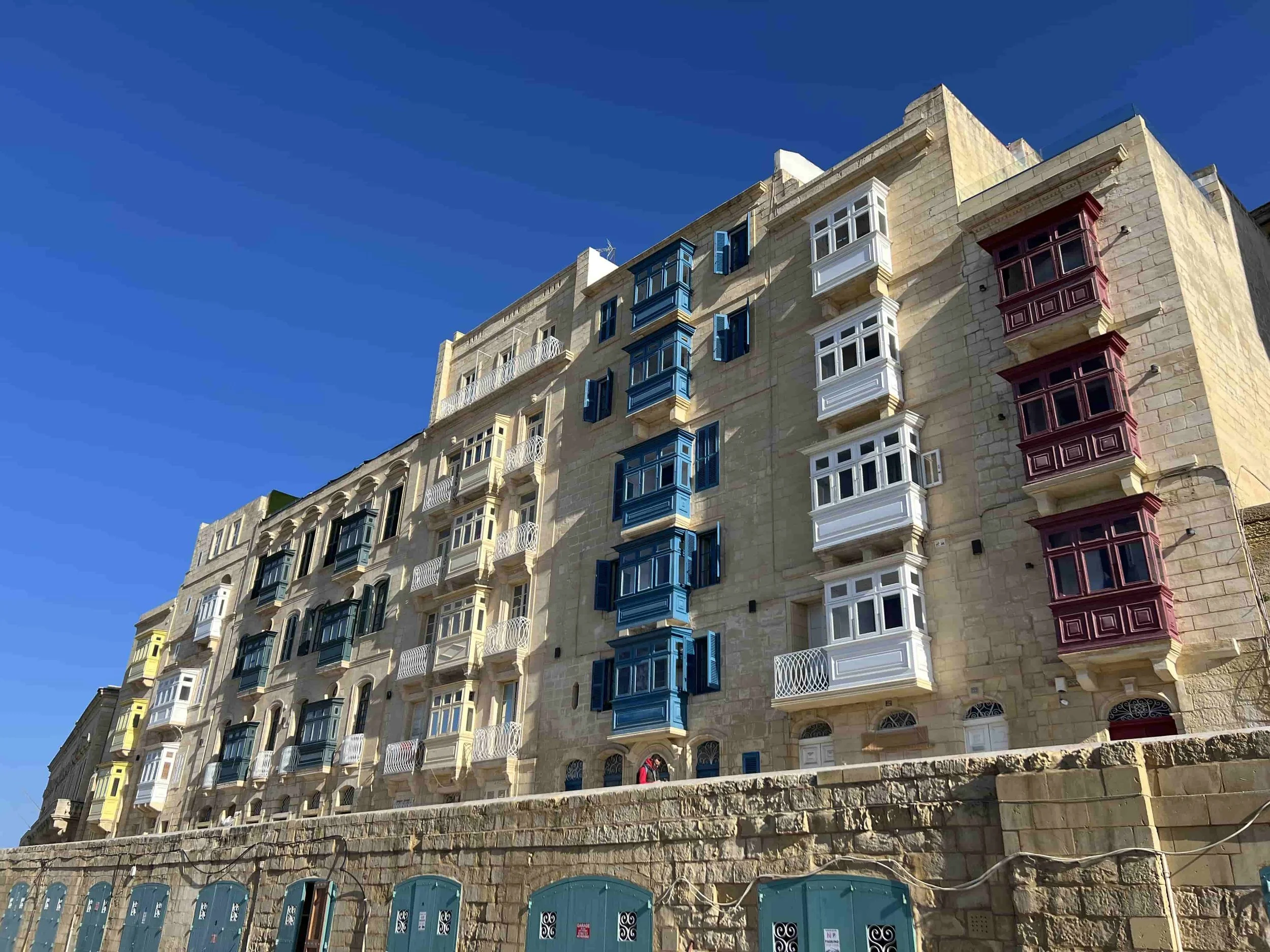 Colorful traditional Maltese balconies on the Marsamxett side of Valletta, facing Manoel Island.