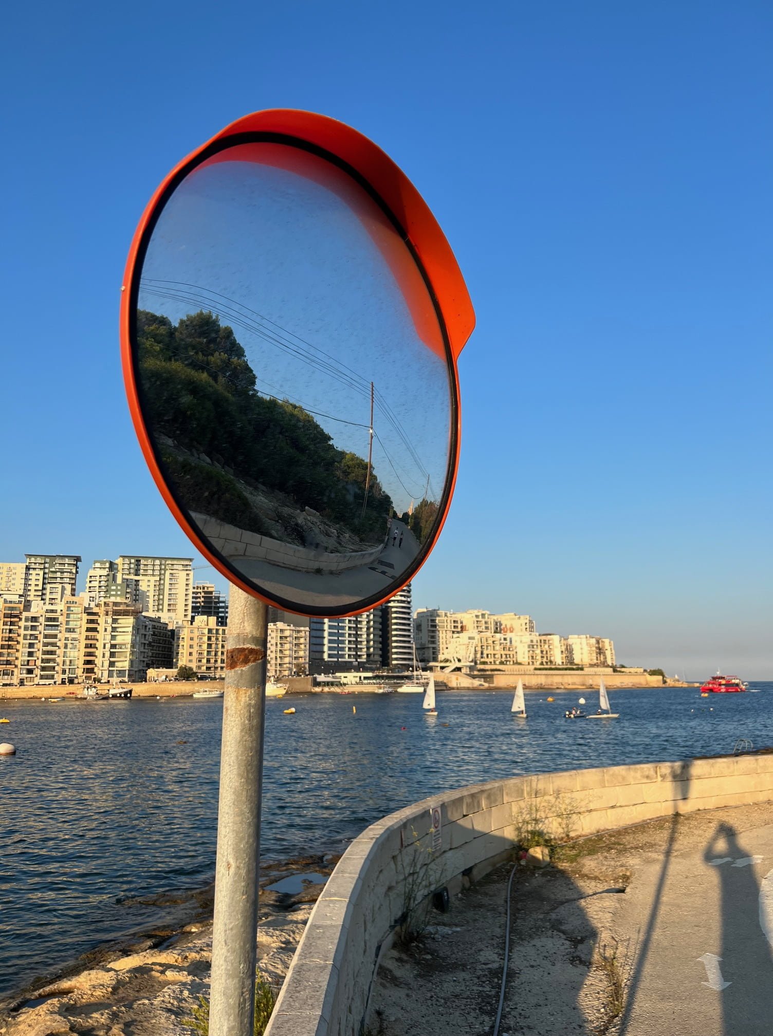 The walking path leading from Gzira promenade towards the swimming zone at Stone Beach.