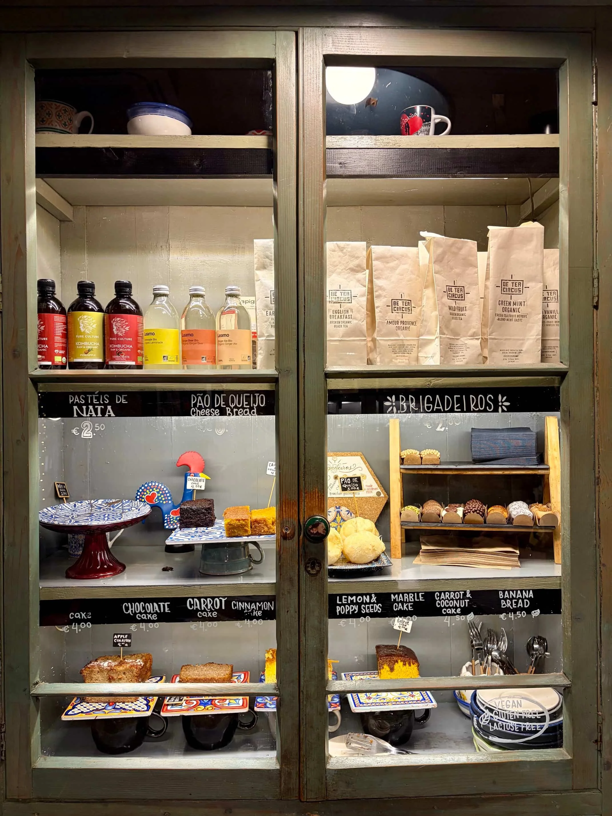 Glass cabinet with pastel de nata and brigadeiros at Coffee Circus Lisboa, Valletta.