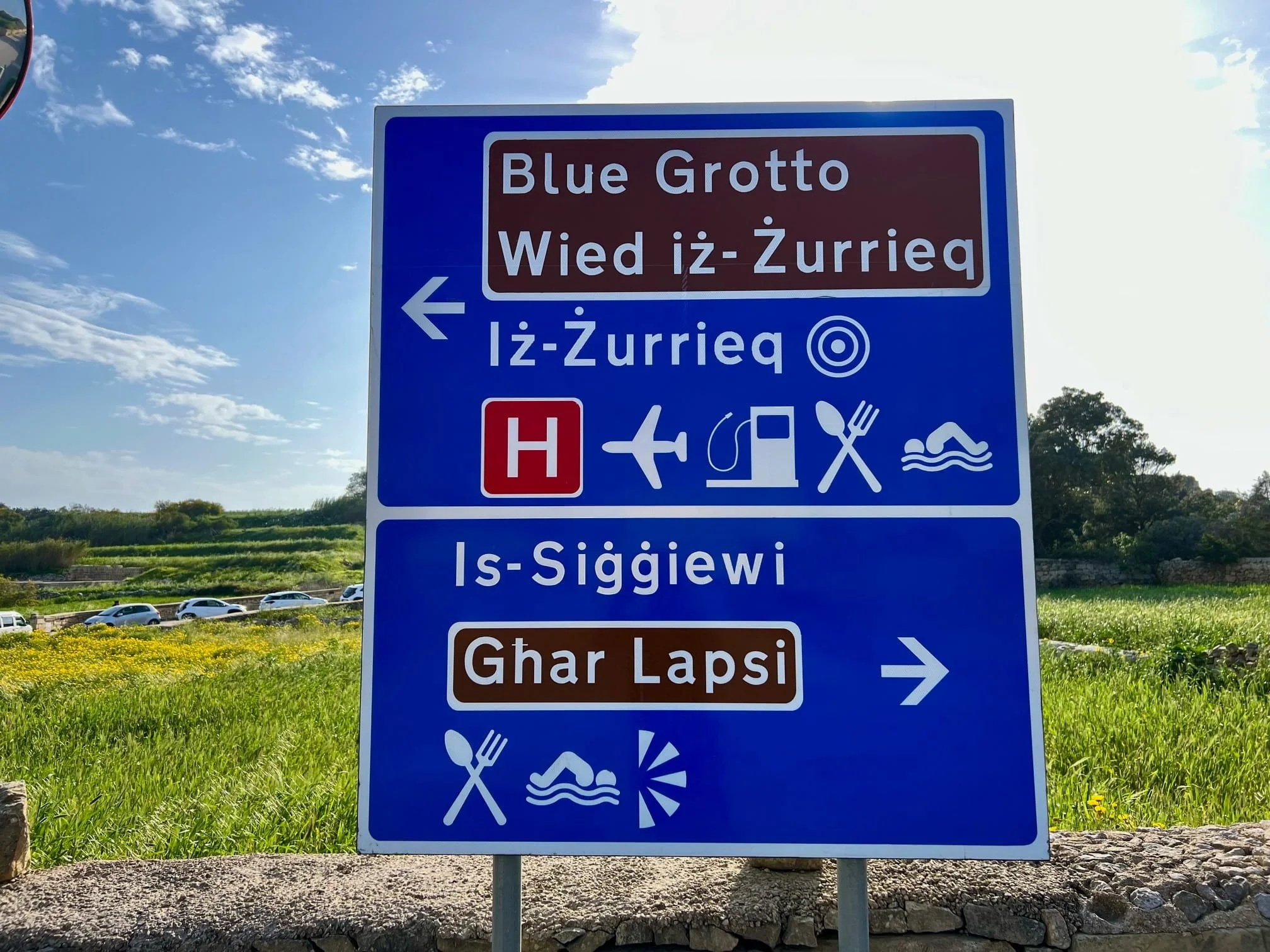 Maltese road sign near entrance to Hagar Qim, located between Blue Grotto and Ghar Lapsi.
