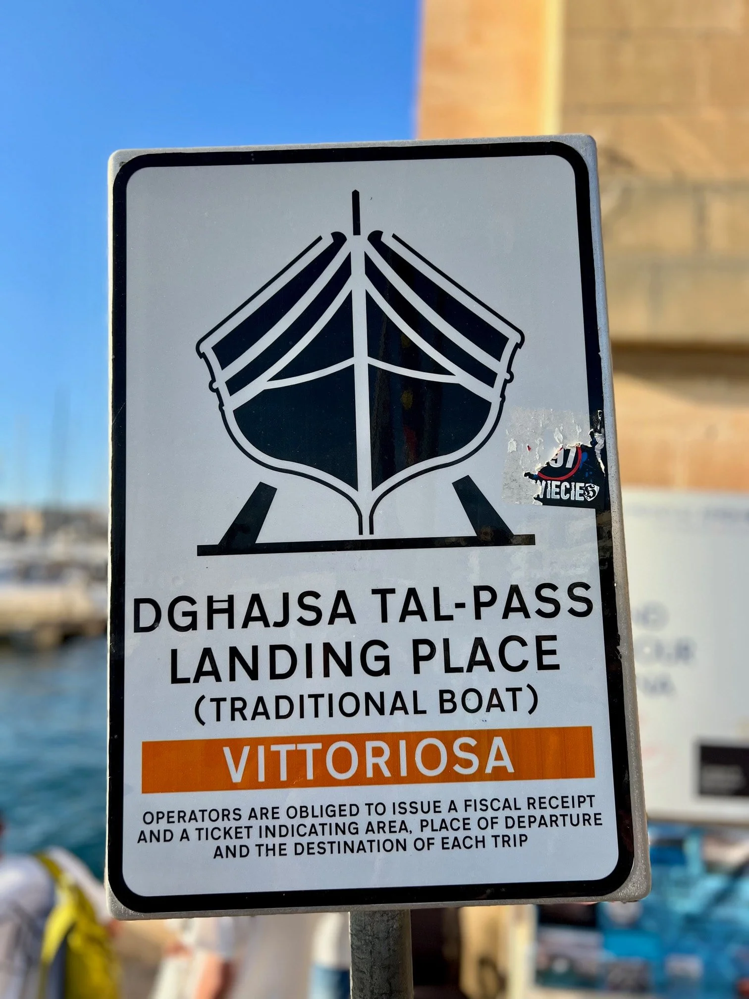 The official 'Dgħajsa Tal-Pass' landing place sign in Vittoriosa, also known as Birgu.