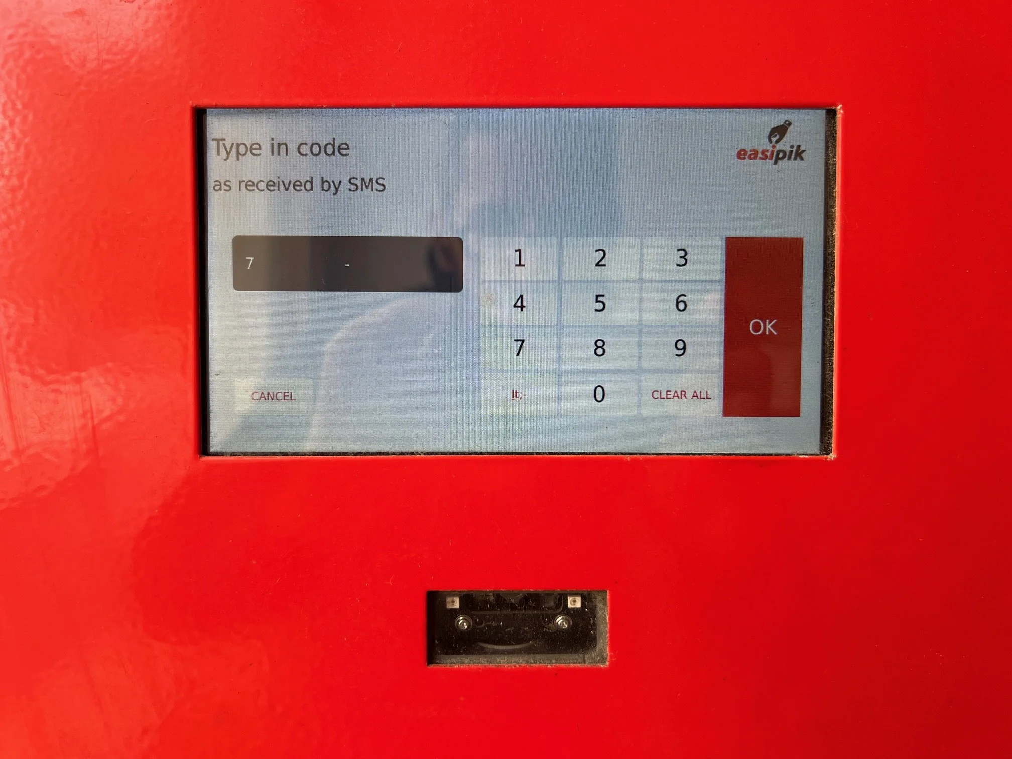 Close-up of the digital touchscreen and keypad on a MaltaPost easipik locker.
