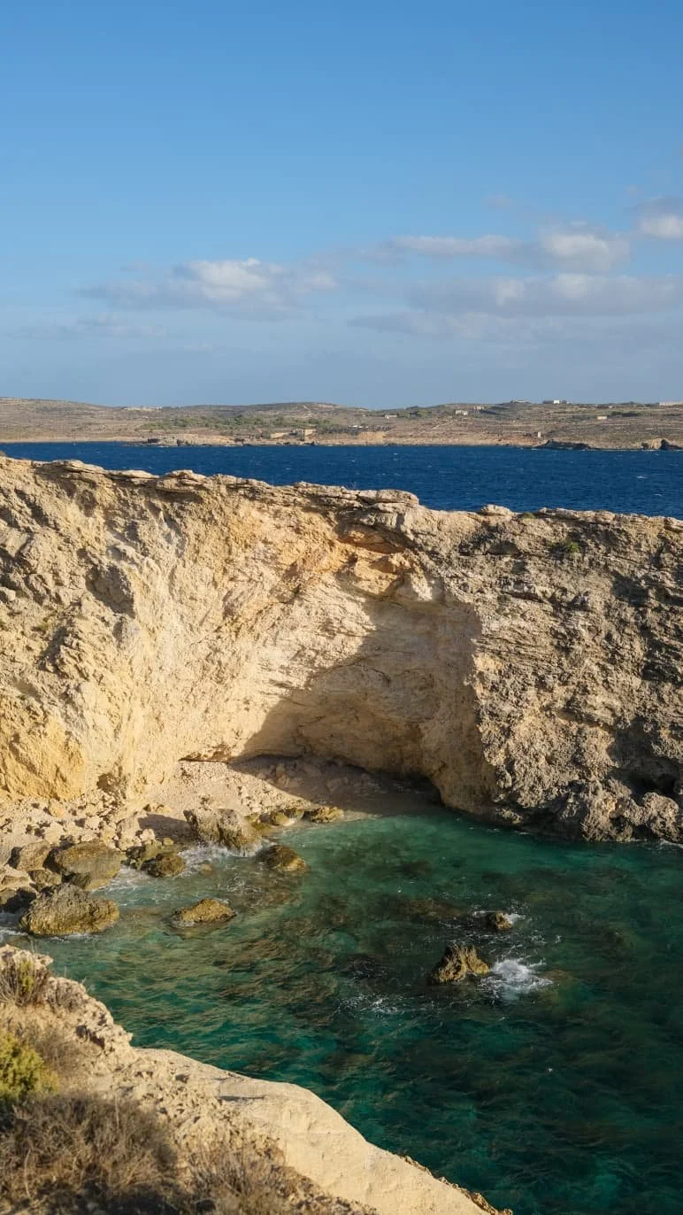 Massive Barbaggan Rocks with Gozo in background.