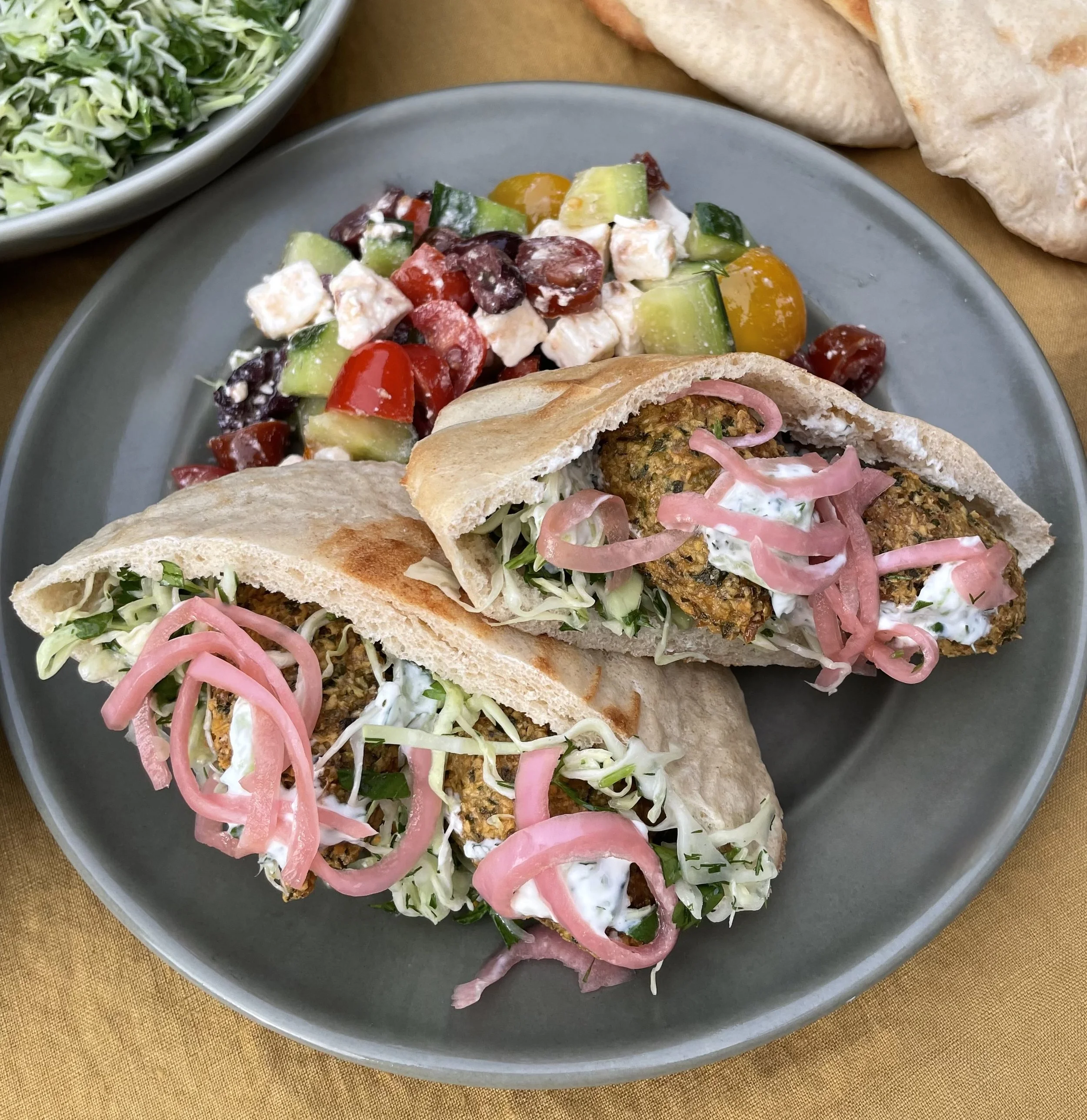 Tuesday, May 19th - Crispy Falafel Pita Wraps with Tzatziki, Herbed Cabbage Slaw and a Mediterranean Salad - Serves 2