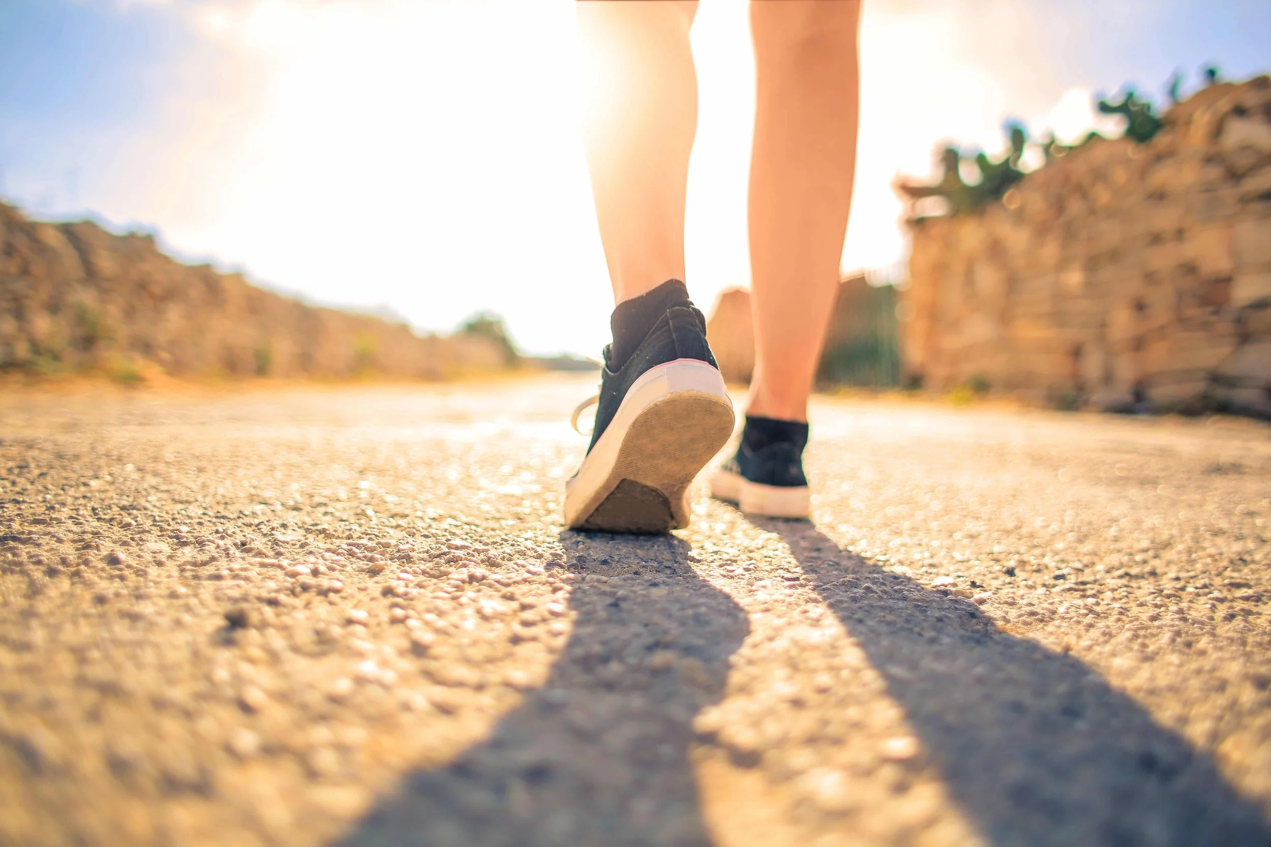 How Stress Affects Cancer and What You Can Do About It - person walking outside