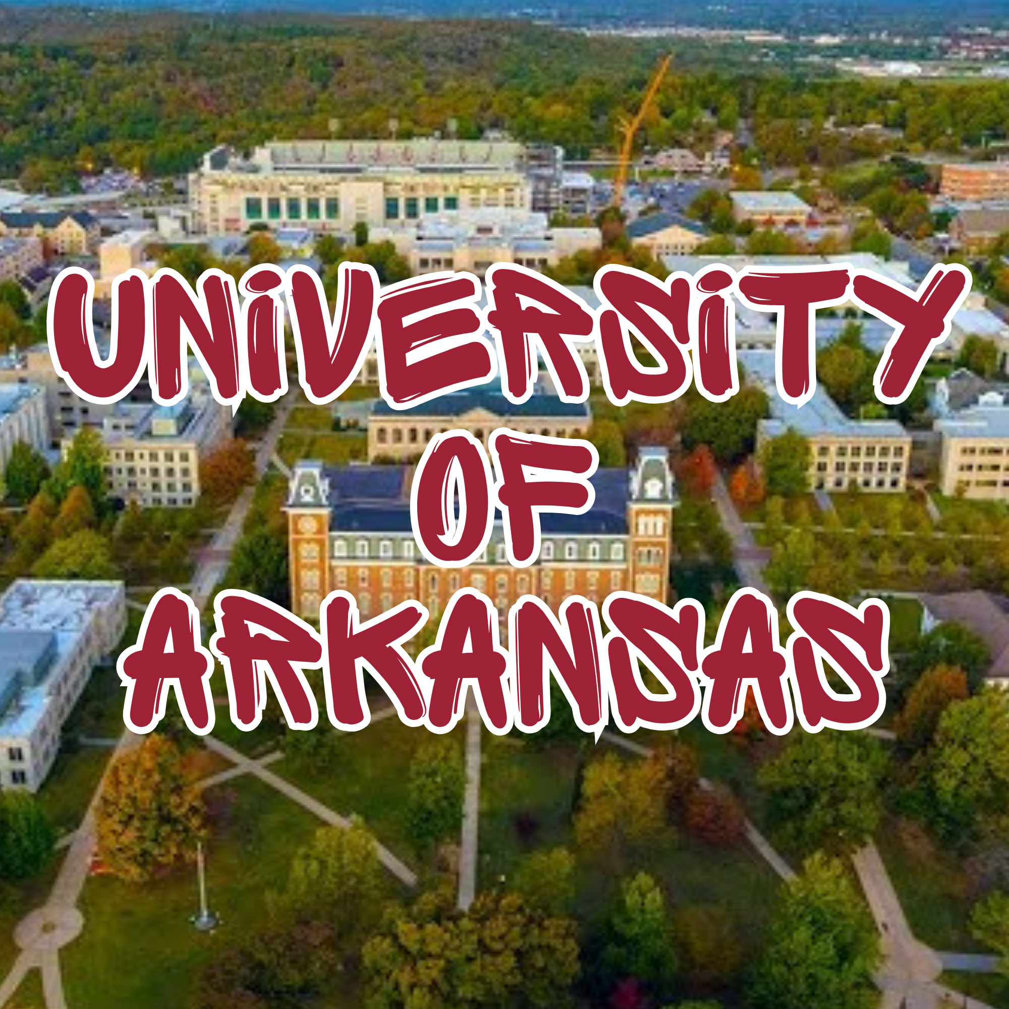 An aerial view of a university campus with multiple buildings, green trees, and a large white building with maroon lettering that says 'UNIVERSITY' at the top. There is an orange construction crane near the white building, and the background shows a 