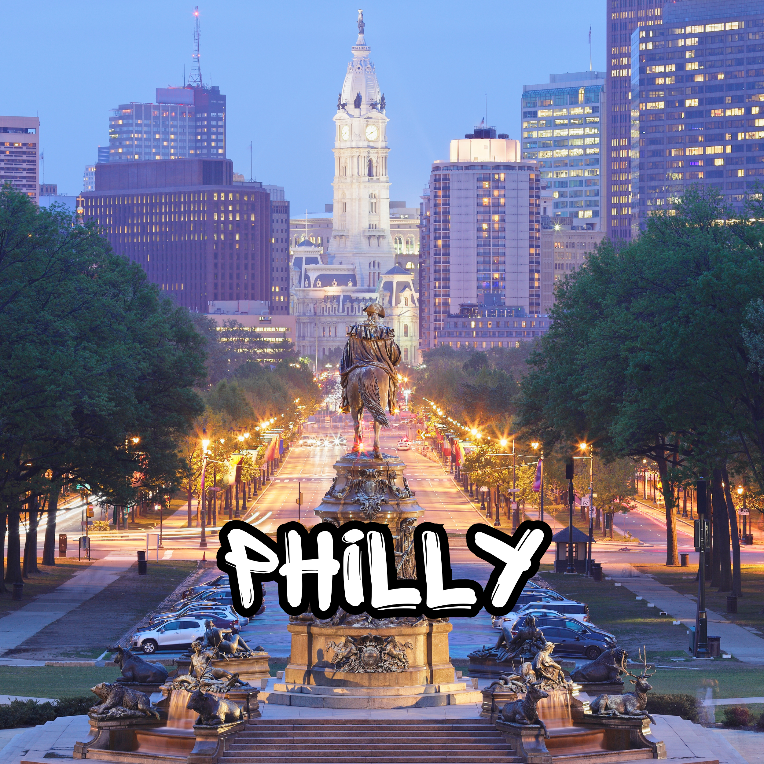 A photo of Philadelphia's City Hall with a fountain and a statue of a seated man in the foreground, trees lining the street, and a city skyline in the background at dusk.