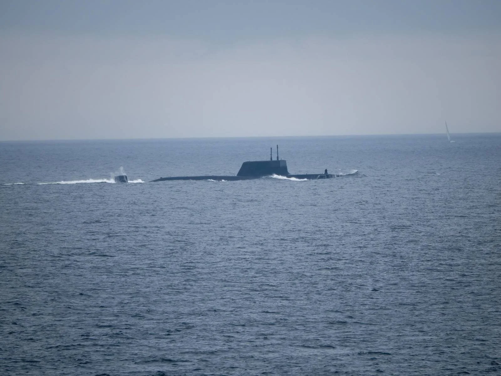We saw a submarine leaving Plymouth