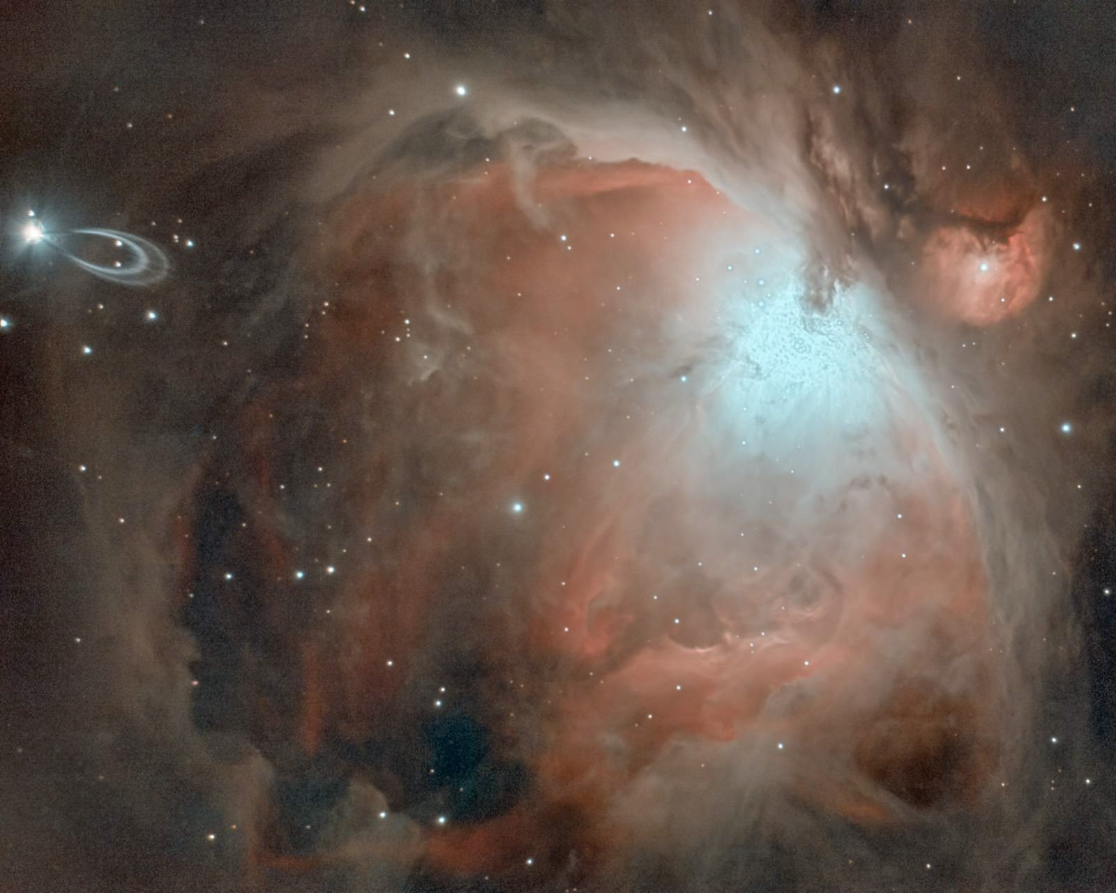 With a C6 Schmitt-Cassegrain. C6's seem to make these loops on bright stars - I like the imperfection.