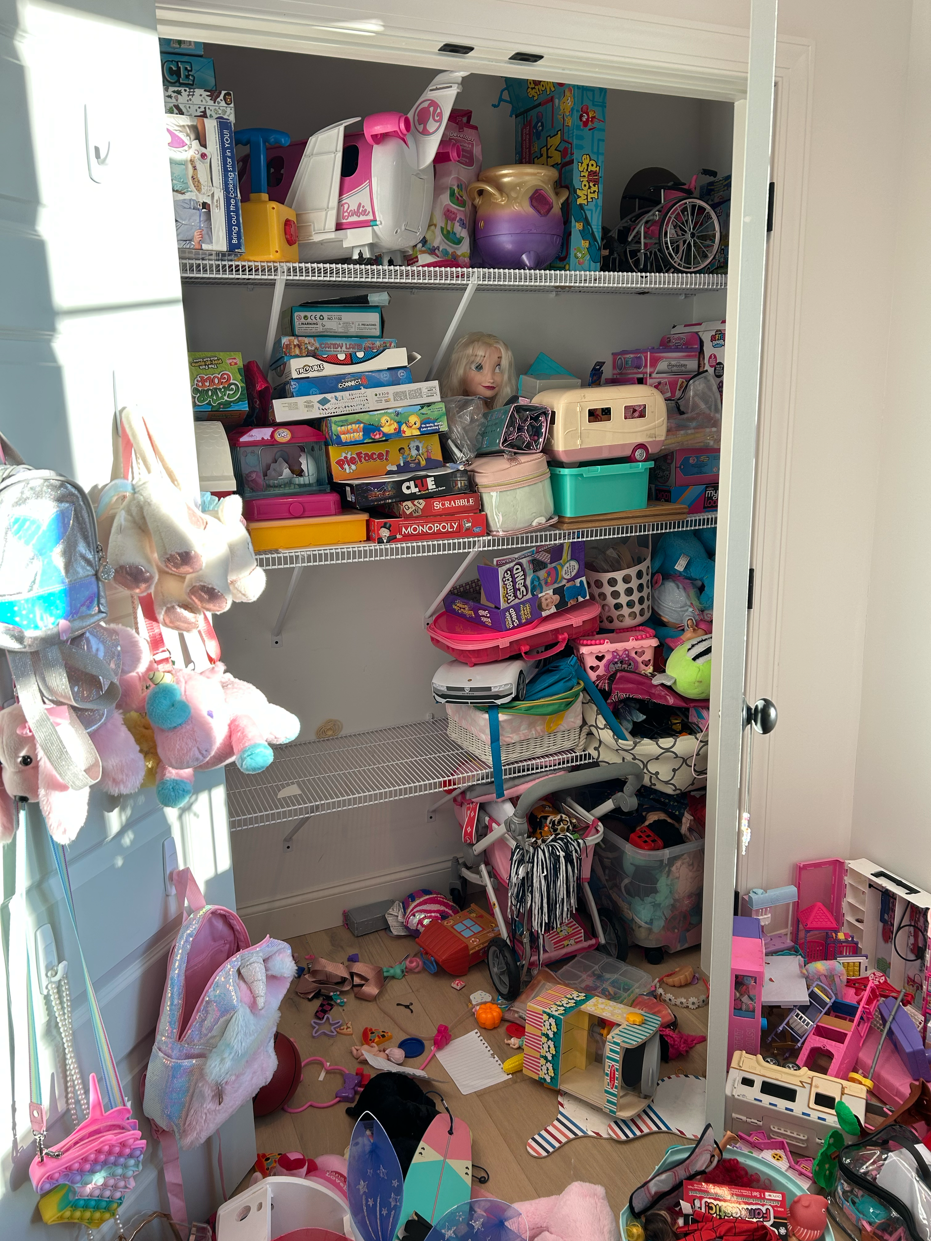 Messy playroom closet
