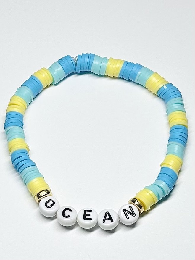 blue and yellow handmade bracelet with ocean beads