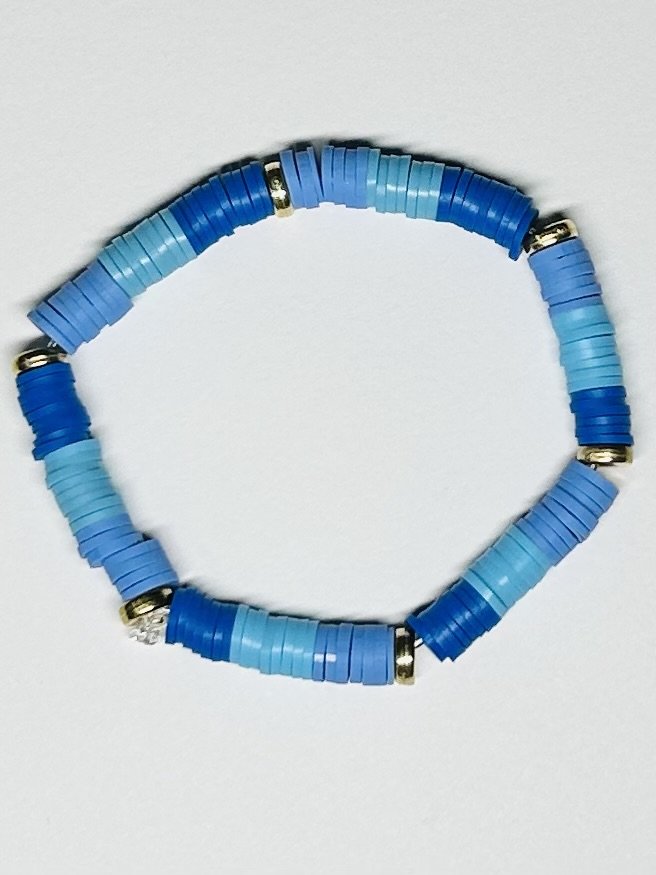 blue handcrafted bracelet with gold accents