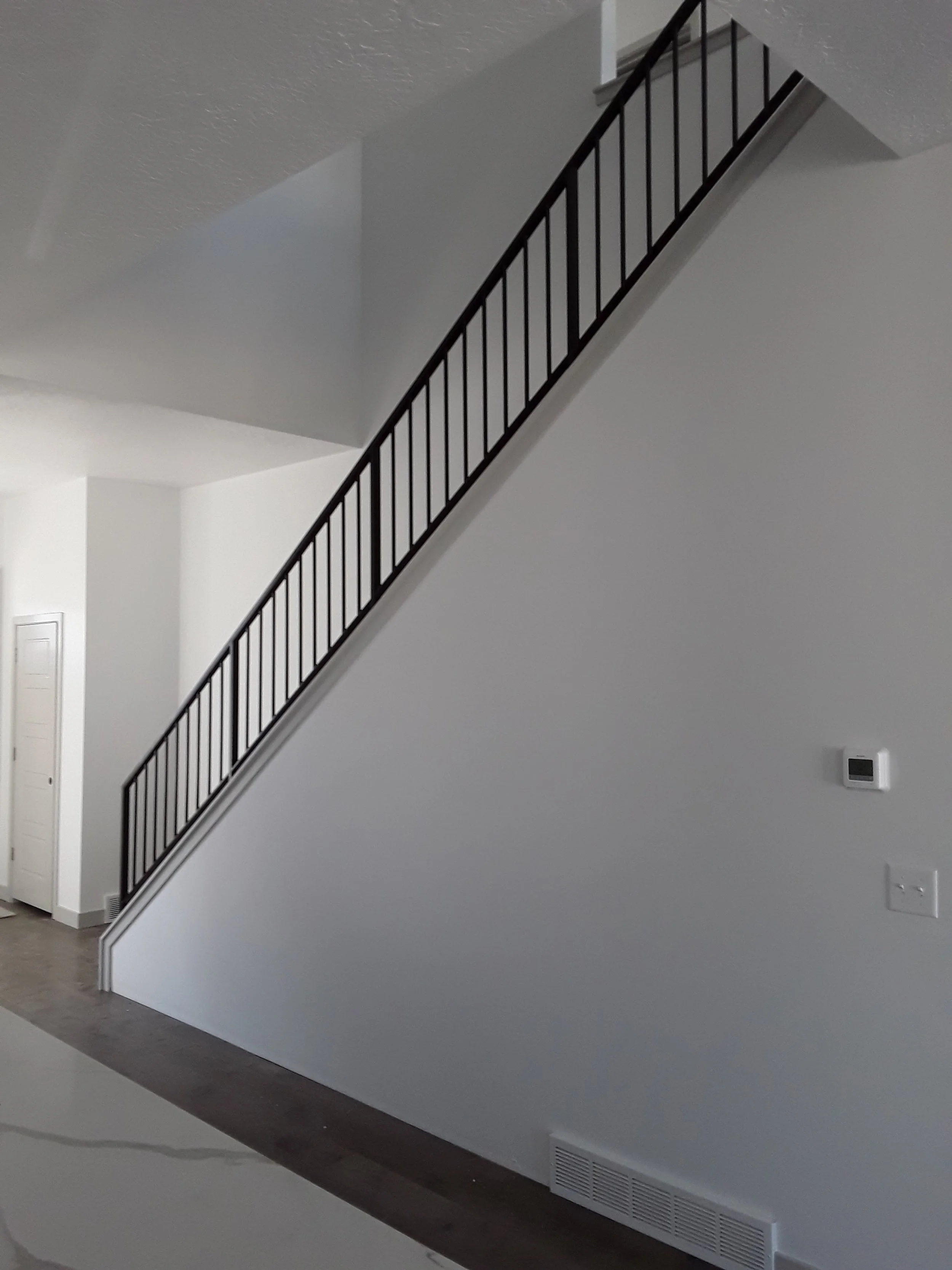 Custom-Steel-Handrail-Interior-Welding-Simple-Modern-Vertical-DownRail-SLC-UT-1.jpg