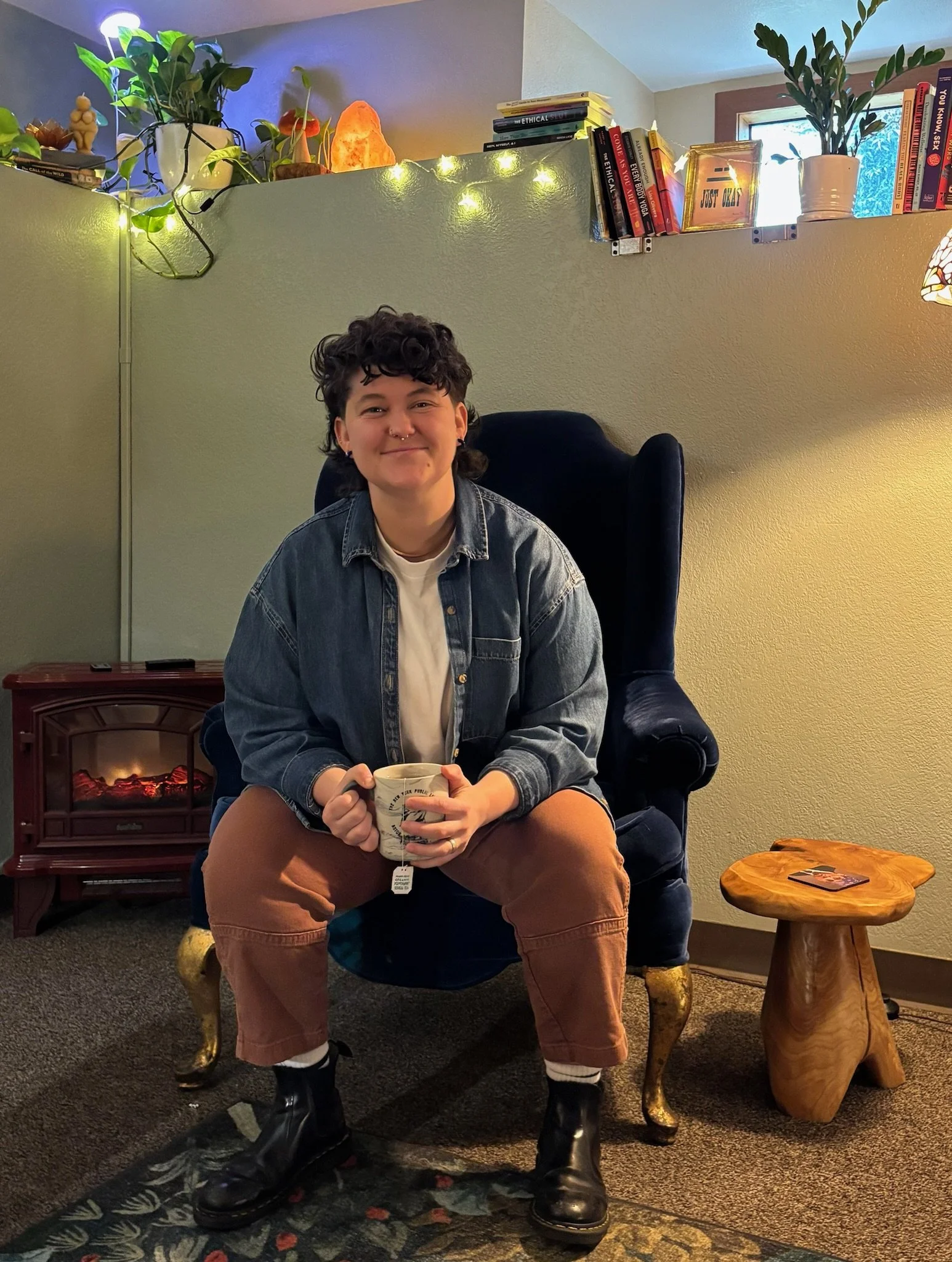 Maggie sitting in their cozy office in Tacoma