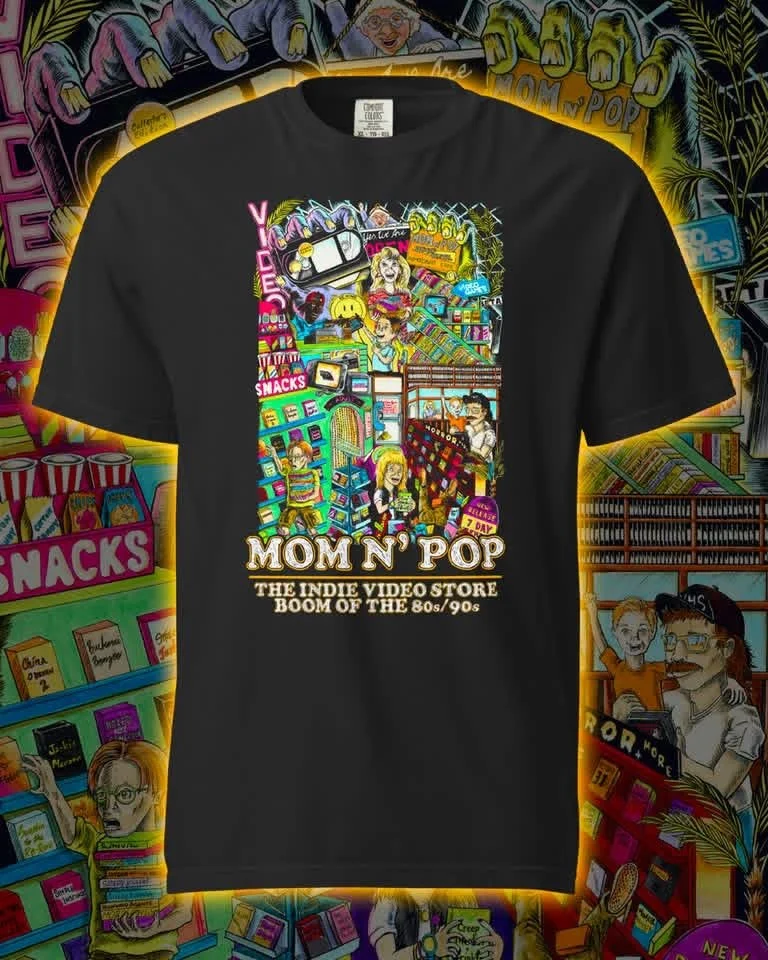 “Mom n Pop: The Indie Video Store Boom of the 80s/90s” poster art in a black shirt