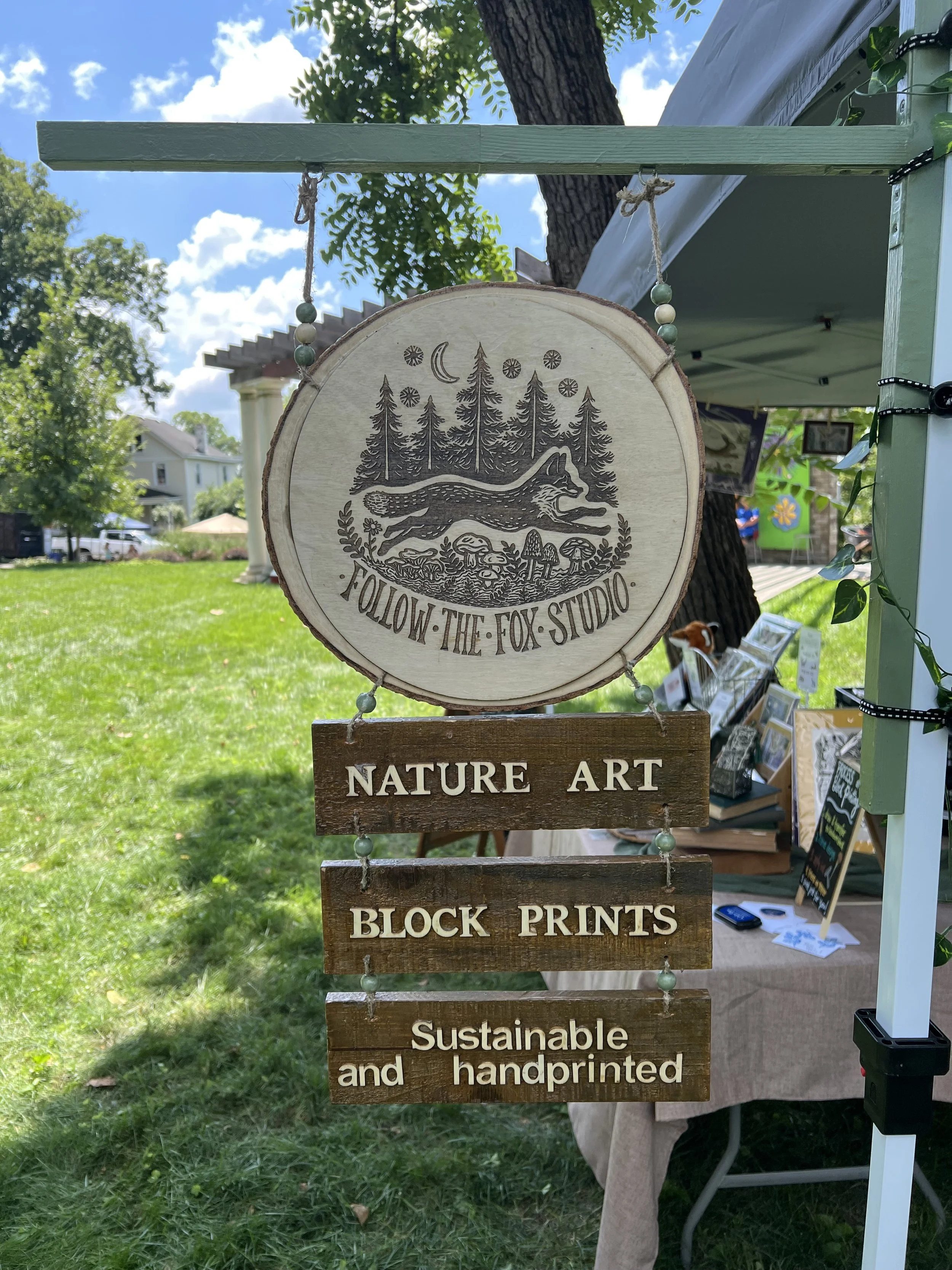 Displaying the new, handmade vendor sign!