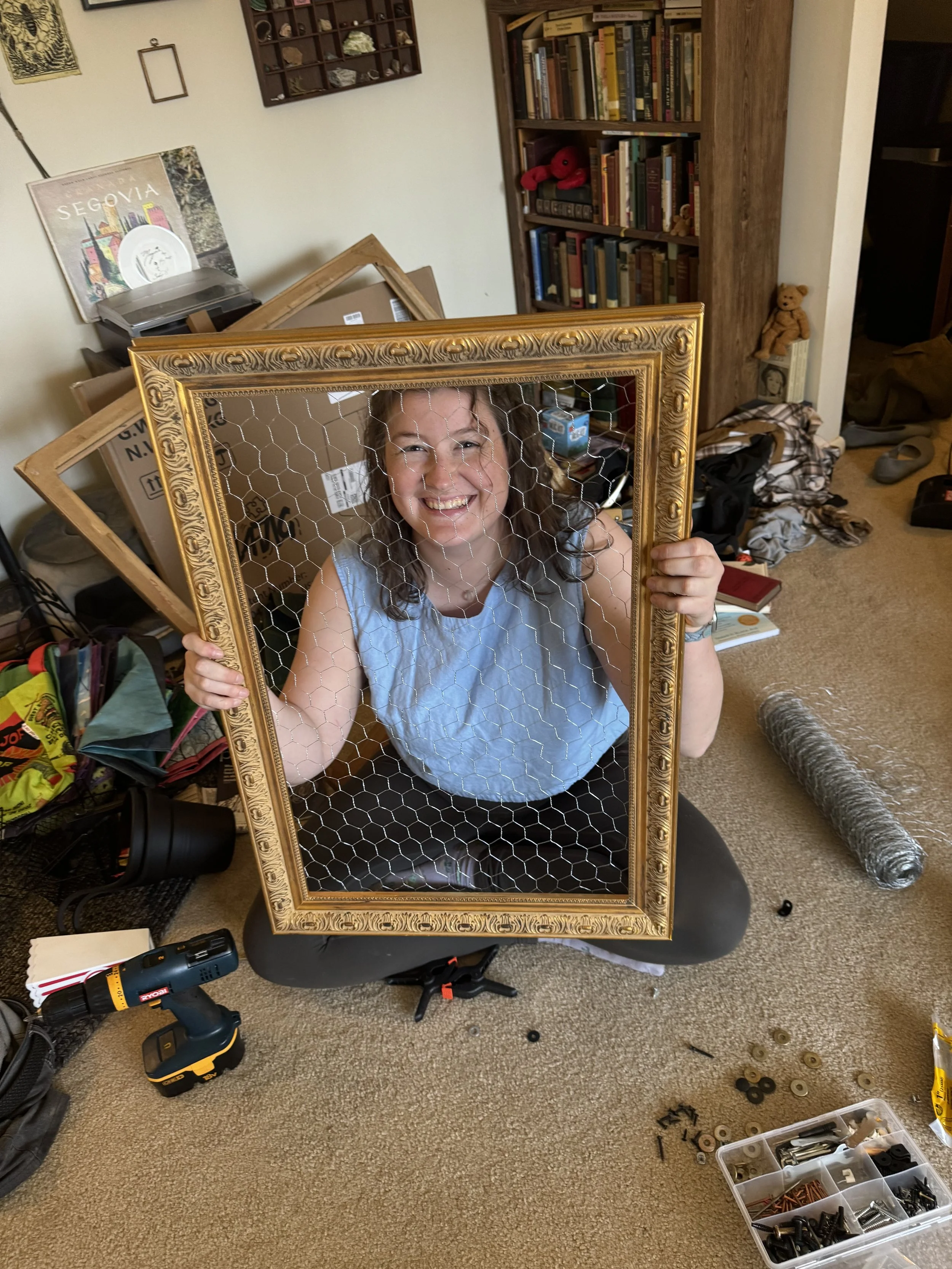 Maggie making a display for the booth