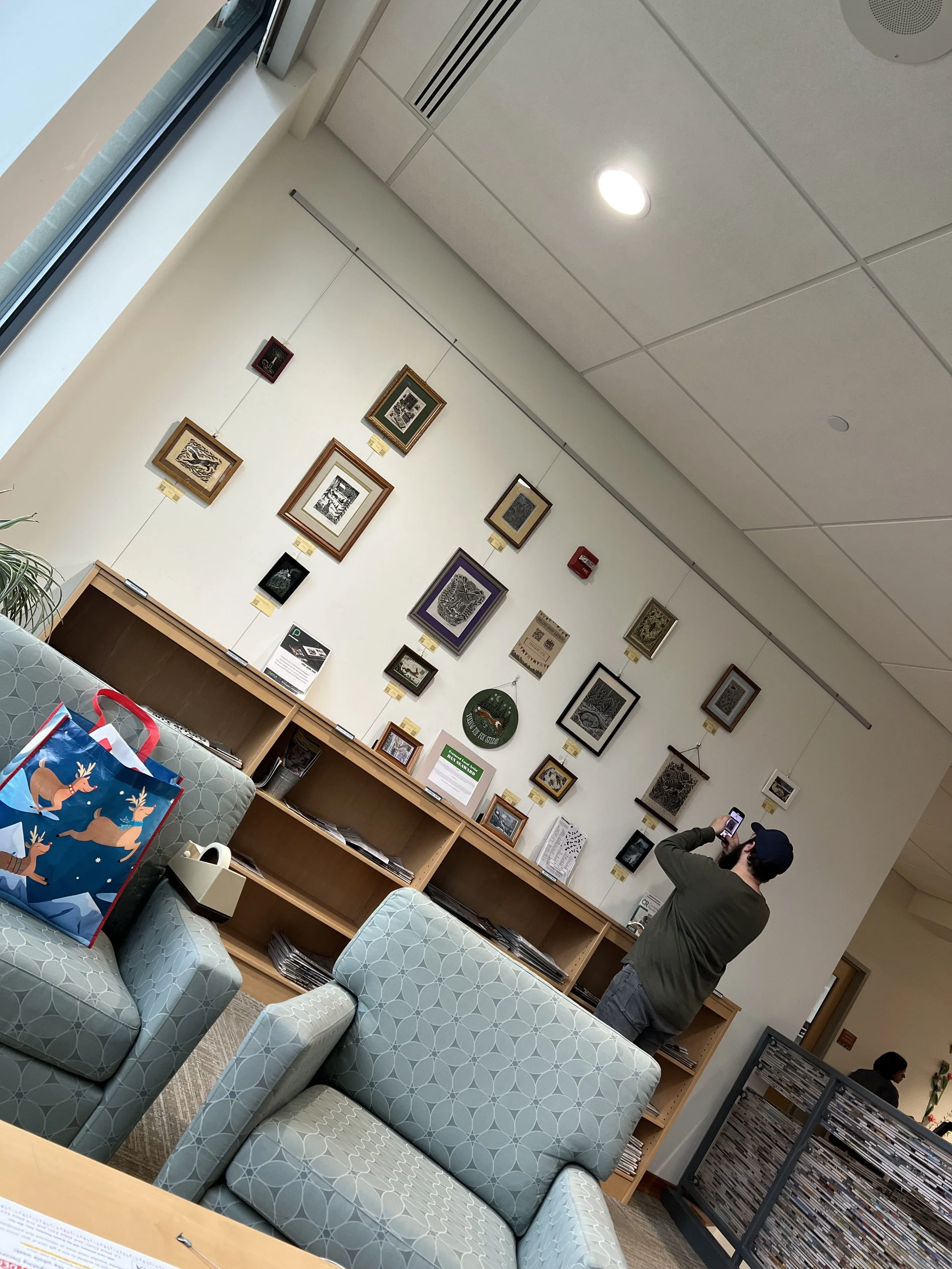 Setting up the Oxford Lane Library Art Gallery Exhibit 2025