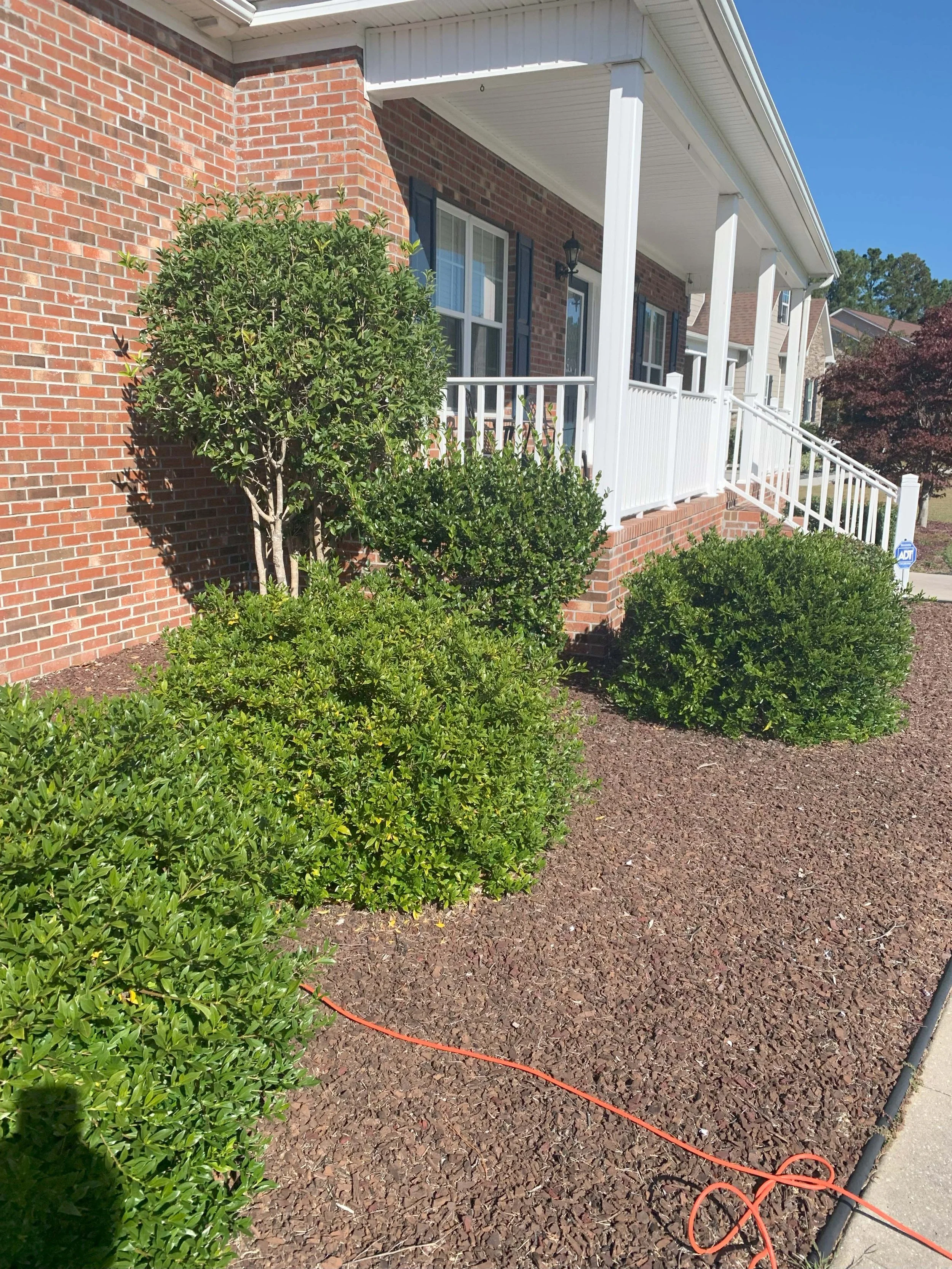 Gardening lawn maintenance mulch bushes trim trees Jacksonville NC Camp Lejeune Swansboro Richlands Onslow County North Carolina