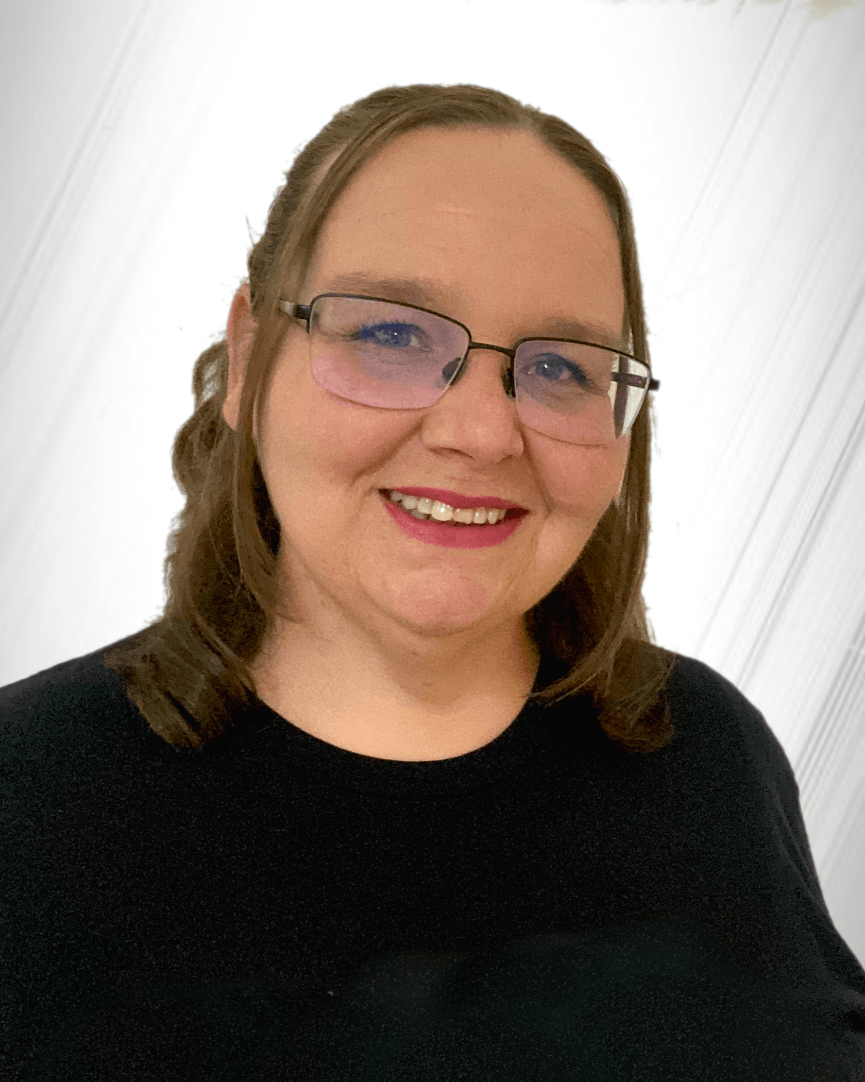 Partial close-up of a woman's face with glasses, smiling, wearing red lipstick, against a plain white background.