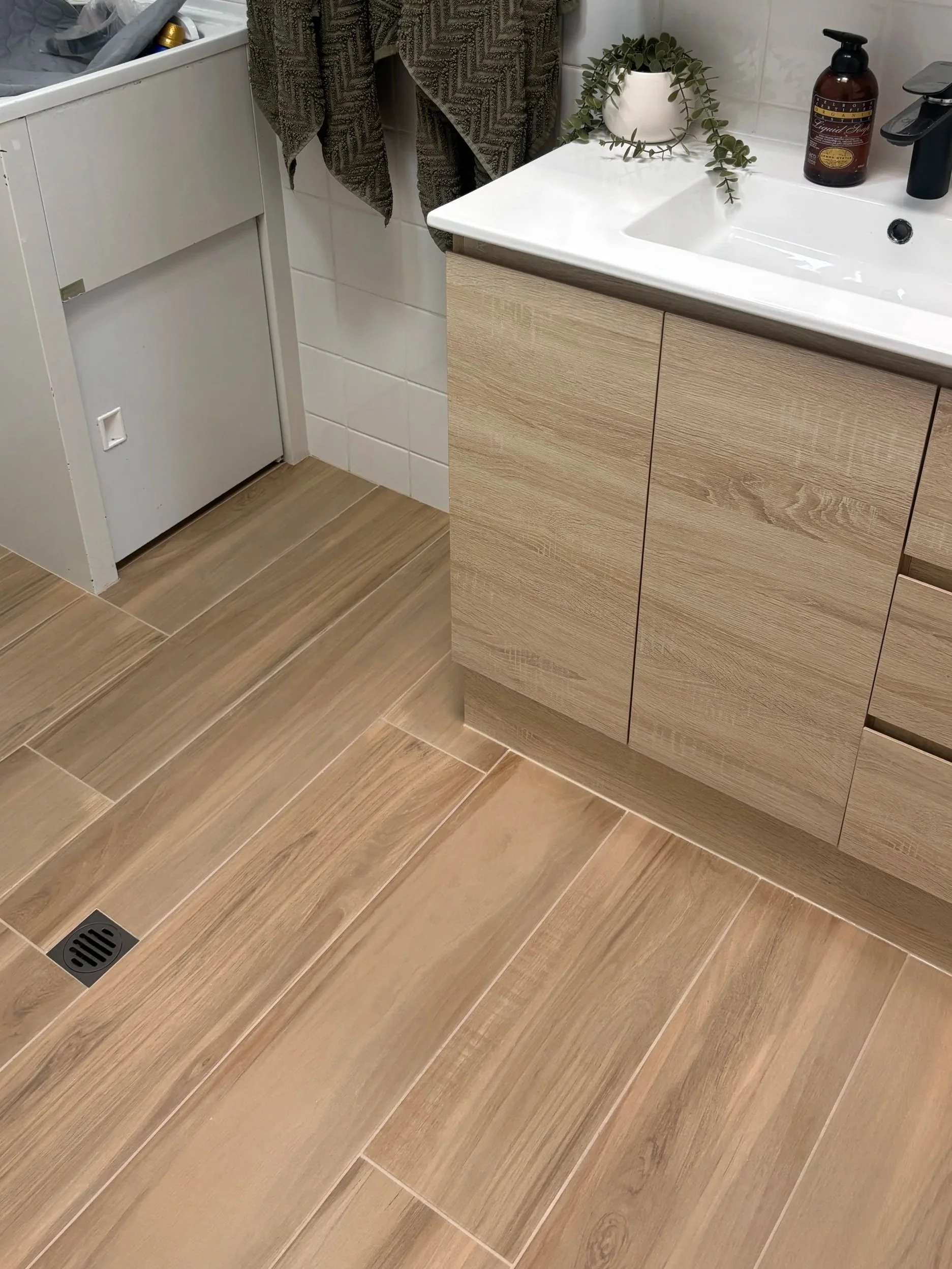 Bathroom floor tiling | Clayfield