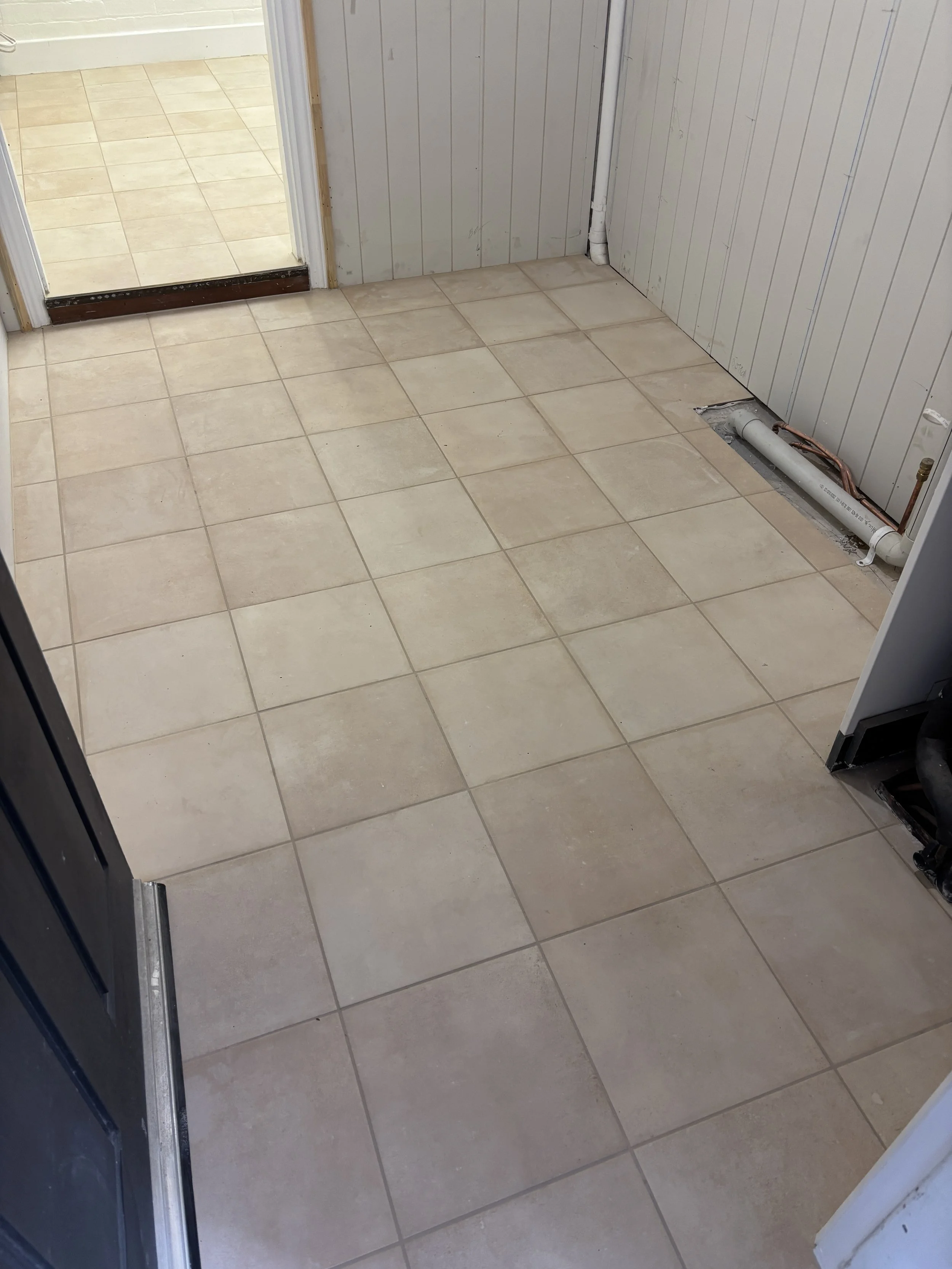 Laundry floor tiling | New Farm