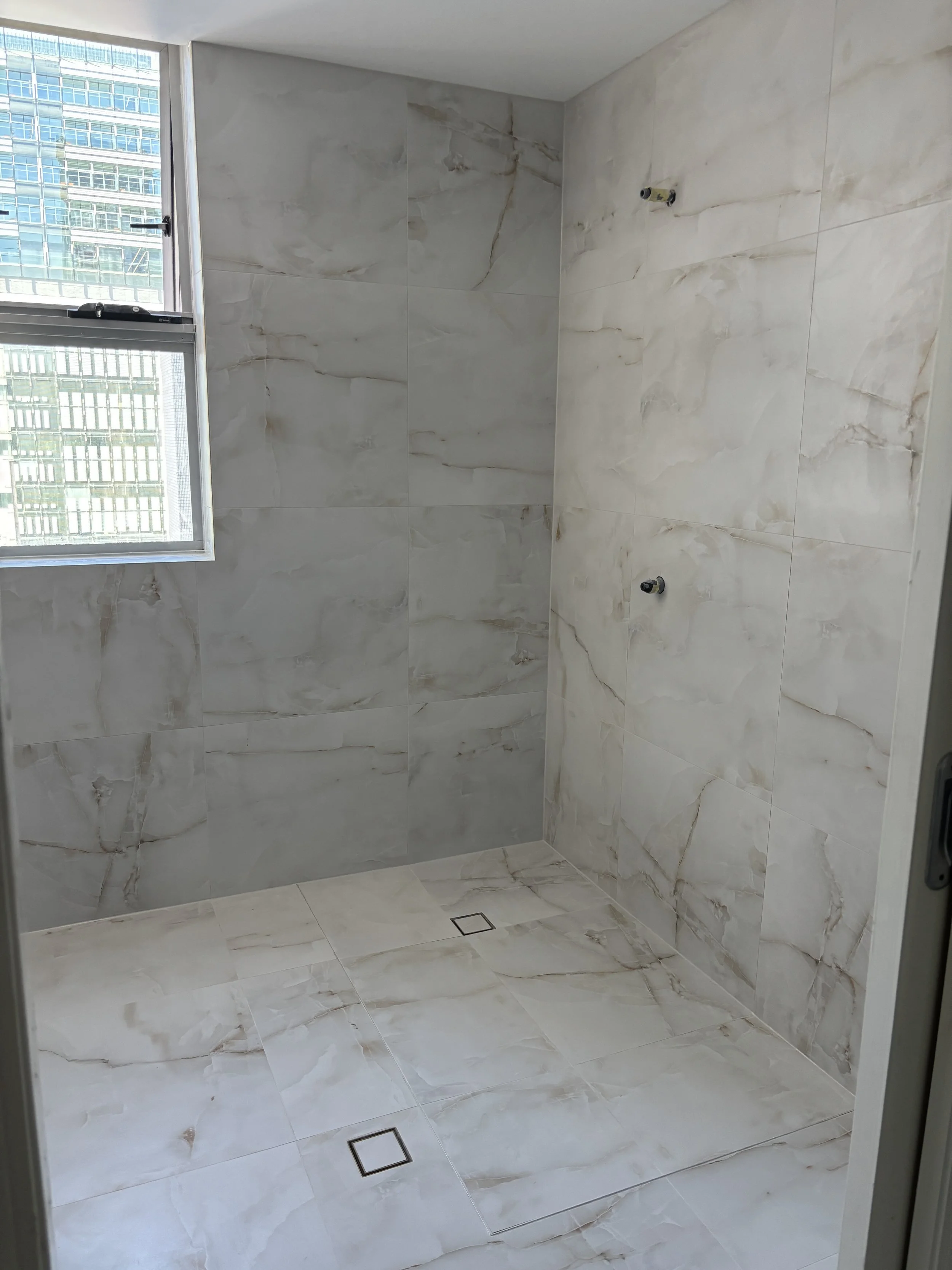 Tank Tower Apartments bathroom tiling | Brisbant City | October 2025