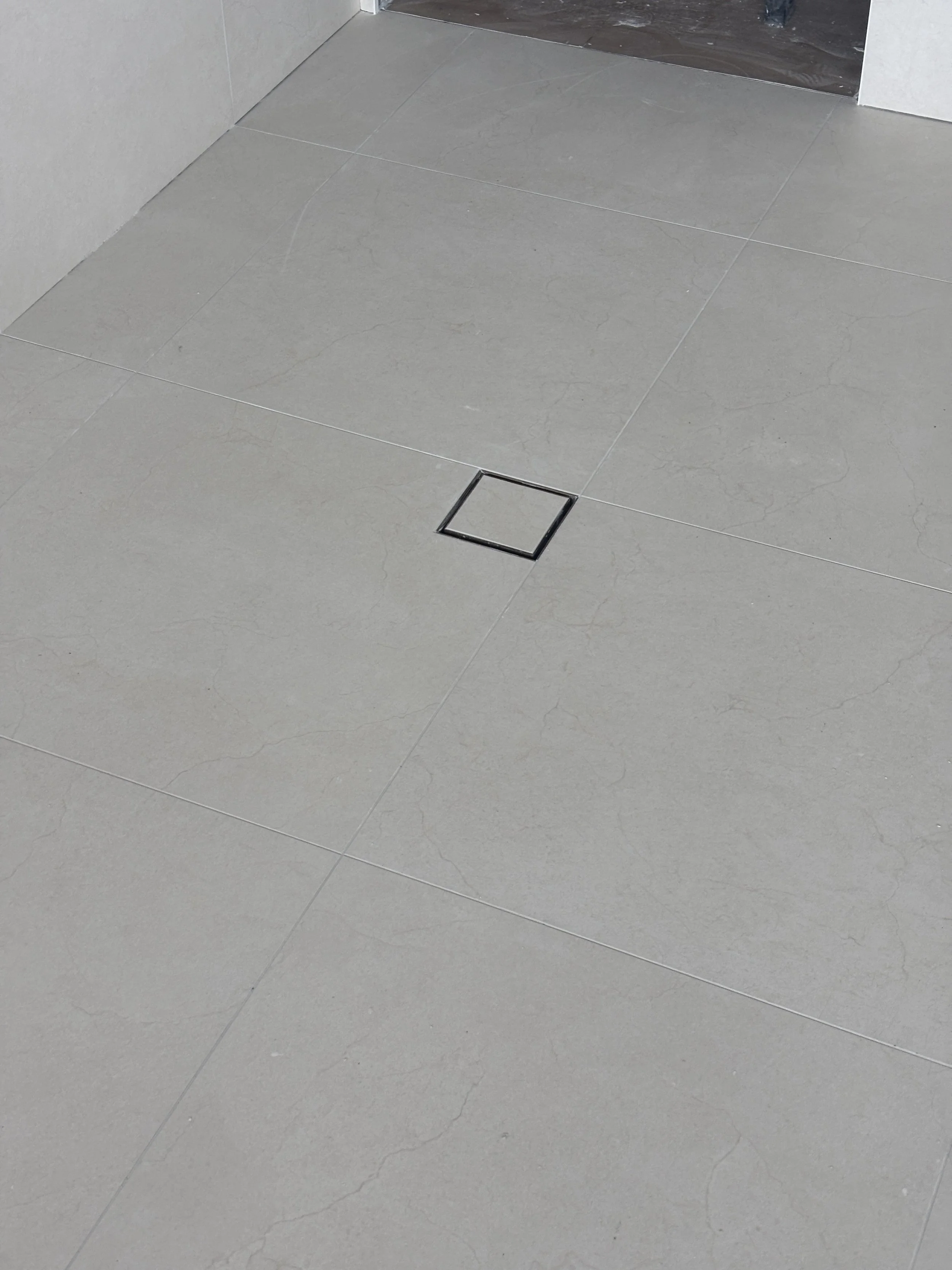 Bathroom floor tiling | Norman Park