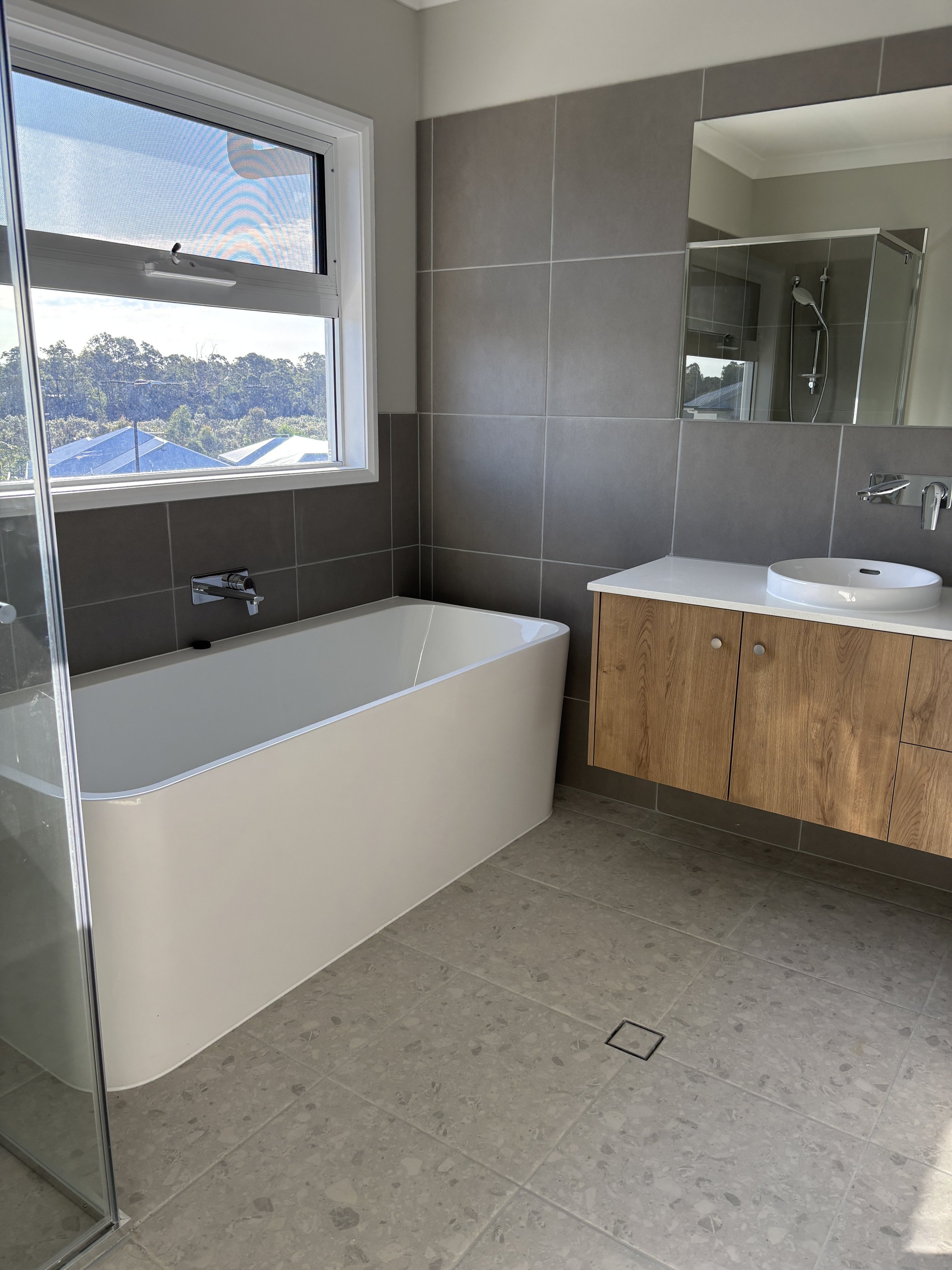 Coral Homes new build bathroom tiling | Coomera | May 2025