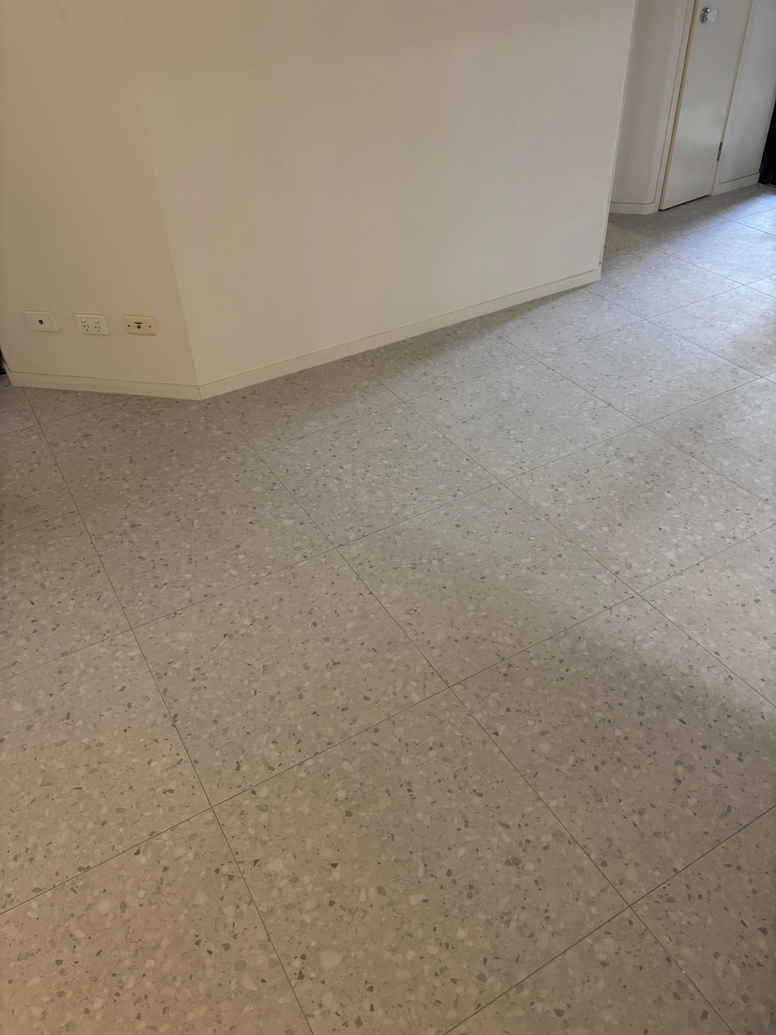 Living and dining floor tiling | New Farm
