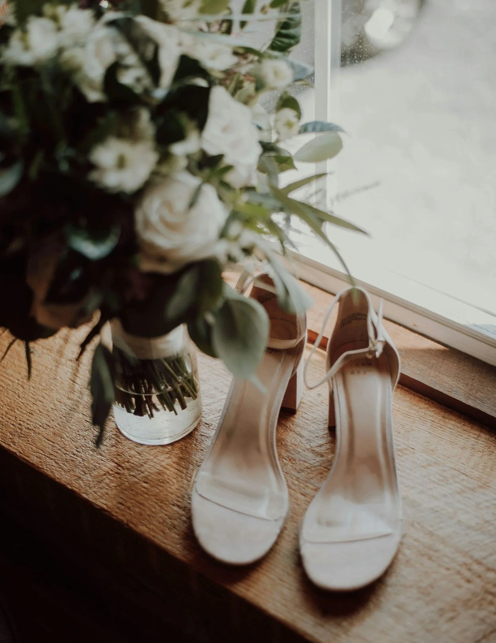 virtual wedding planning brides shoes and flower bouquet