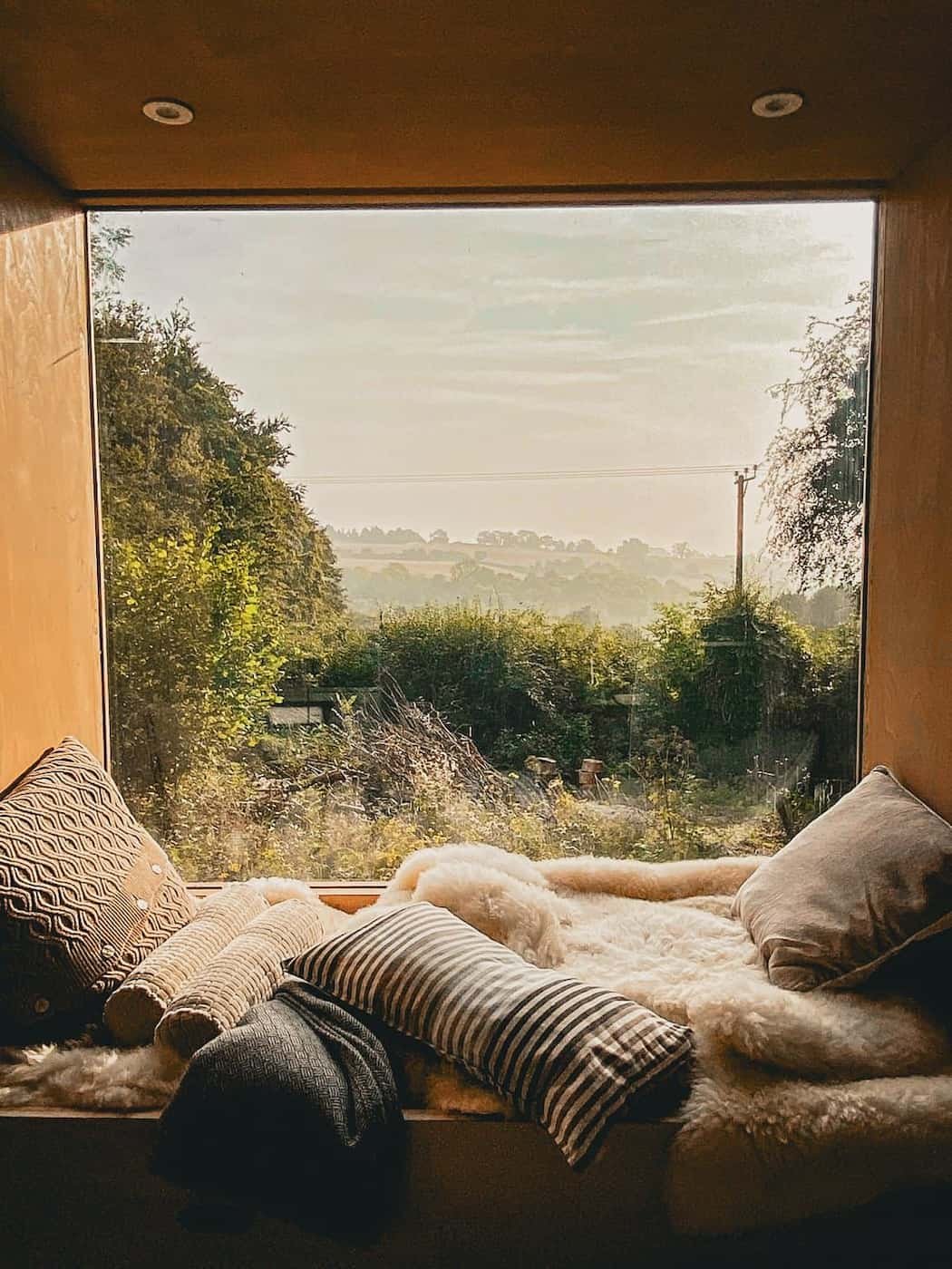 The cosy window seat in the garden office/bedroom in Marlow, Buckinghshire