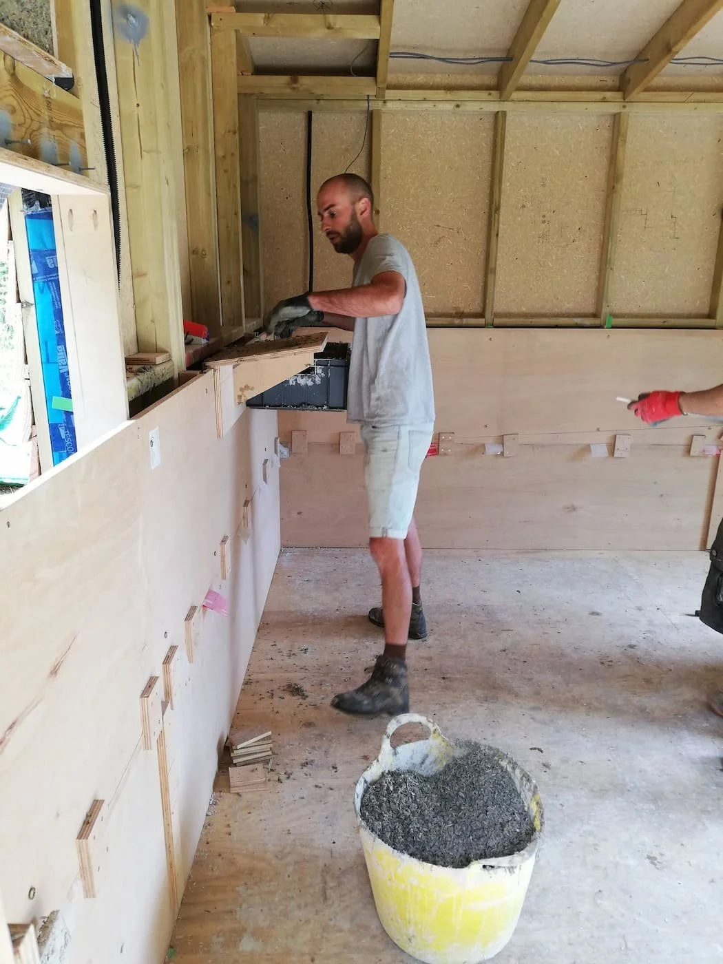 The interior walls of the garden office/bedroom being rendered in Marlow, Buckinghshire