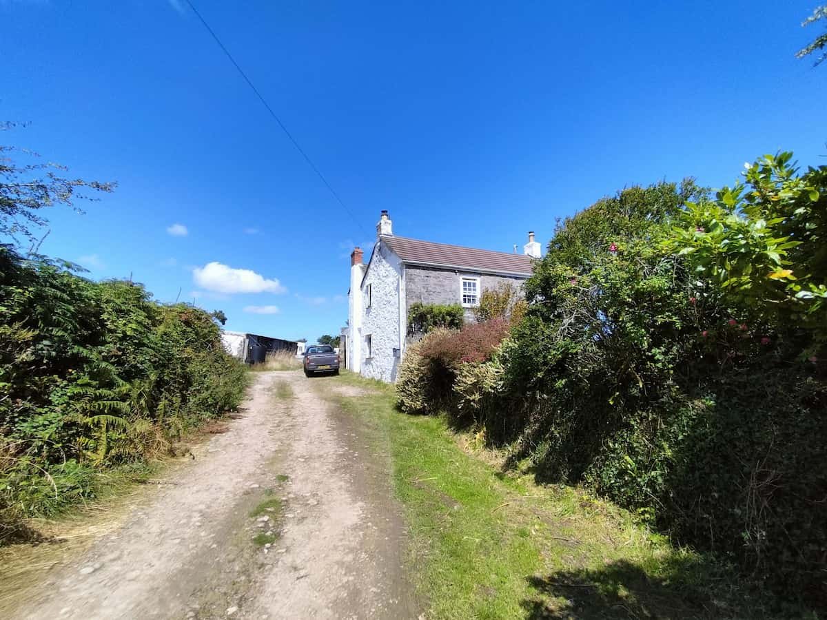 Exterior of Trengrove Cottage before renovation in Falmouth from the road
