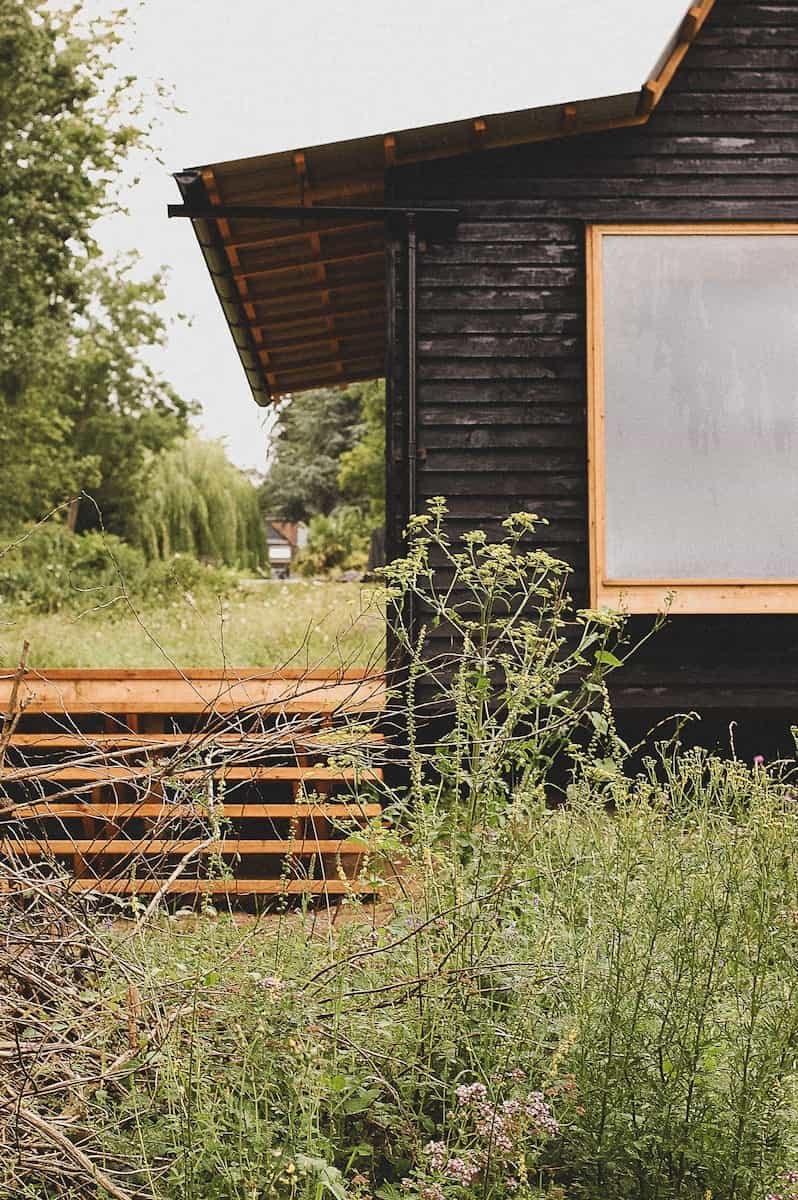 The side profile, showing the timber cladding of the garden office/bedroom after construction in Marlow, Buckinghshire