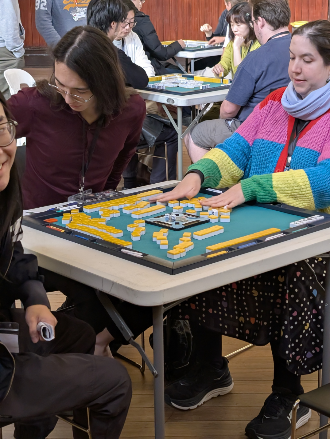 Player with a colourful sweater at Vic Riichi Open 2025