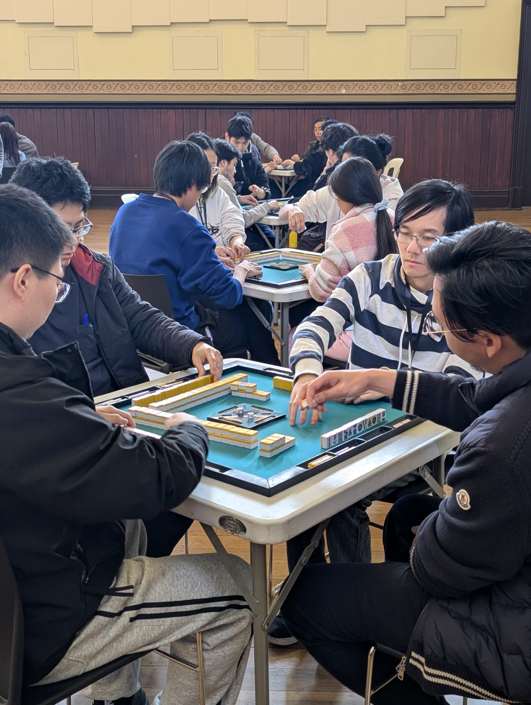 Close up shot of mahjong players at Vic Riichi Open 2025