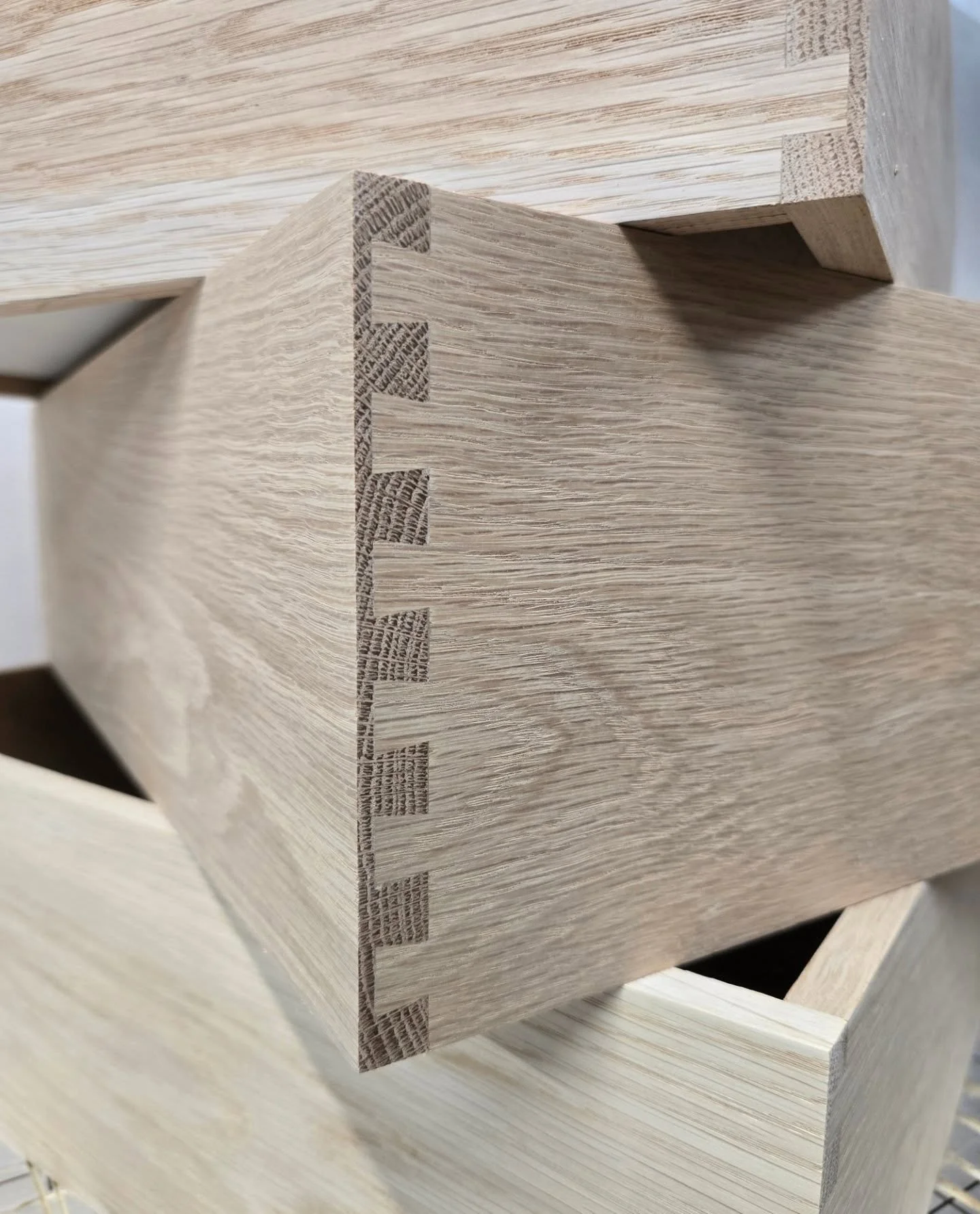 We are currently manufacturing solid American white oak drawers to complement a large wardrobe.

These drawers feature robust dovetail joints, enhancing their durability and longevity.

These were made using @ujktools dovetail jig from @axminstertool