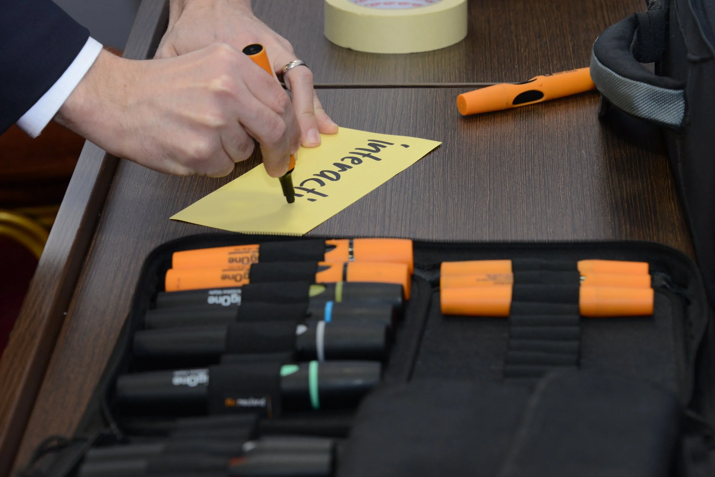 Writing a card in preparation of a session.